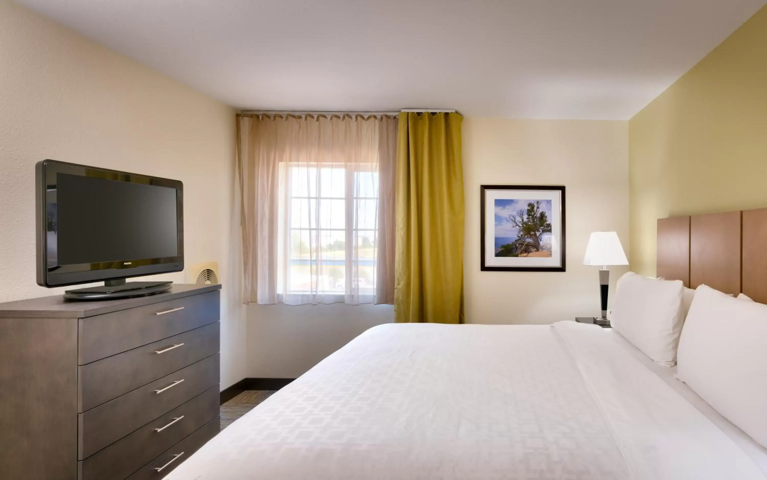 Photo of the whole room, Bed in Candlewood Suites Plano East, an IHG Hotel