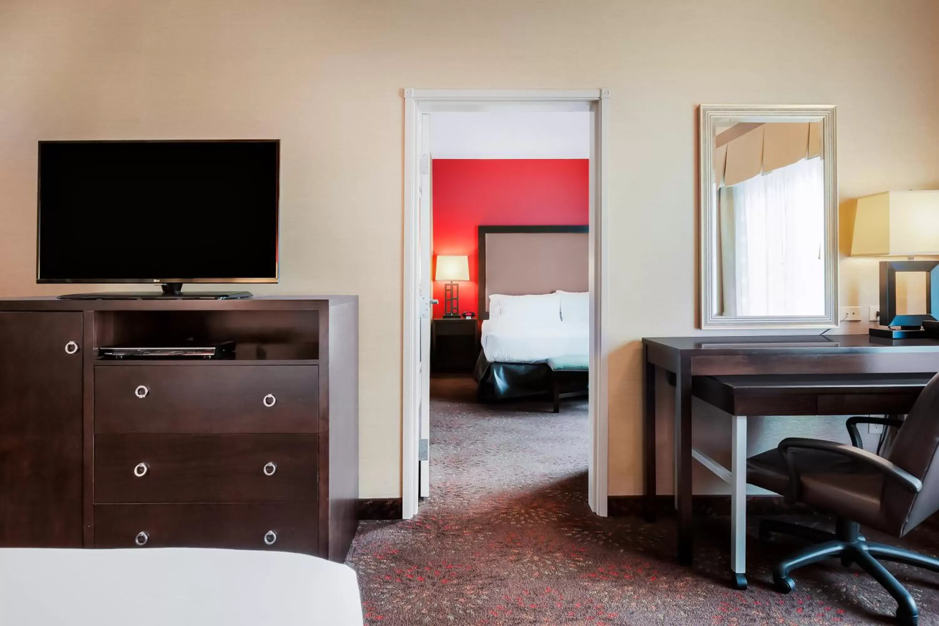 Photo of the whole room, TV/Entertainment Center in Holiday Inn Express and Suites Missoula, an IHG Hotel