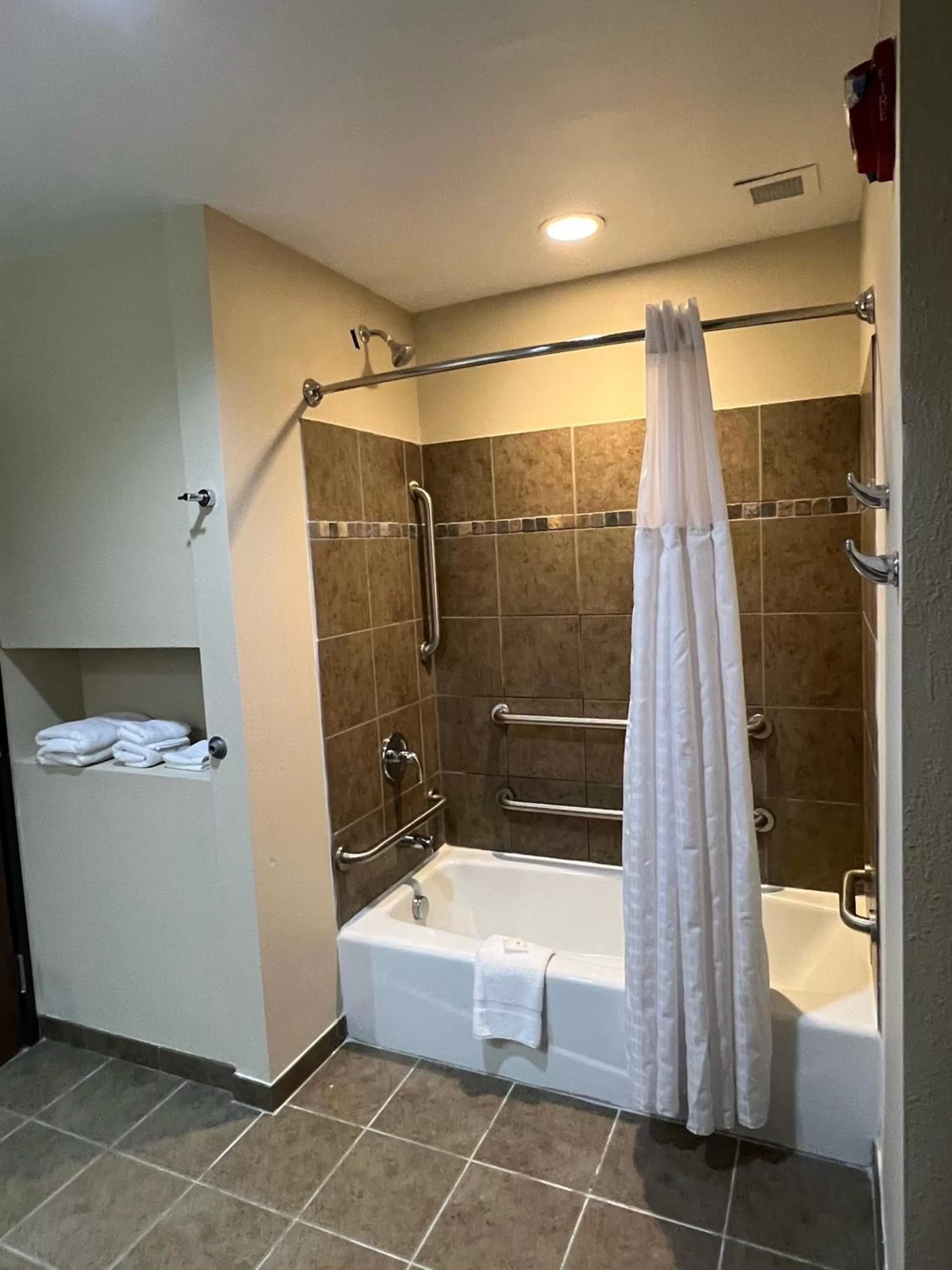 Bathroom in HomeTowne Studios & Suites by Red Roof Washington