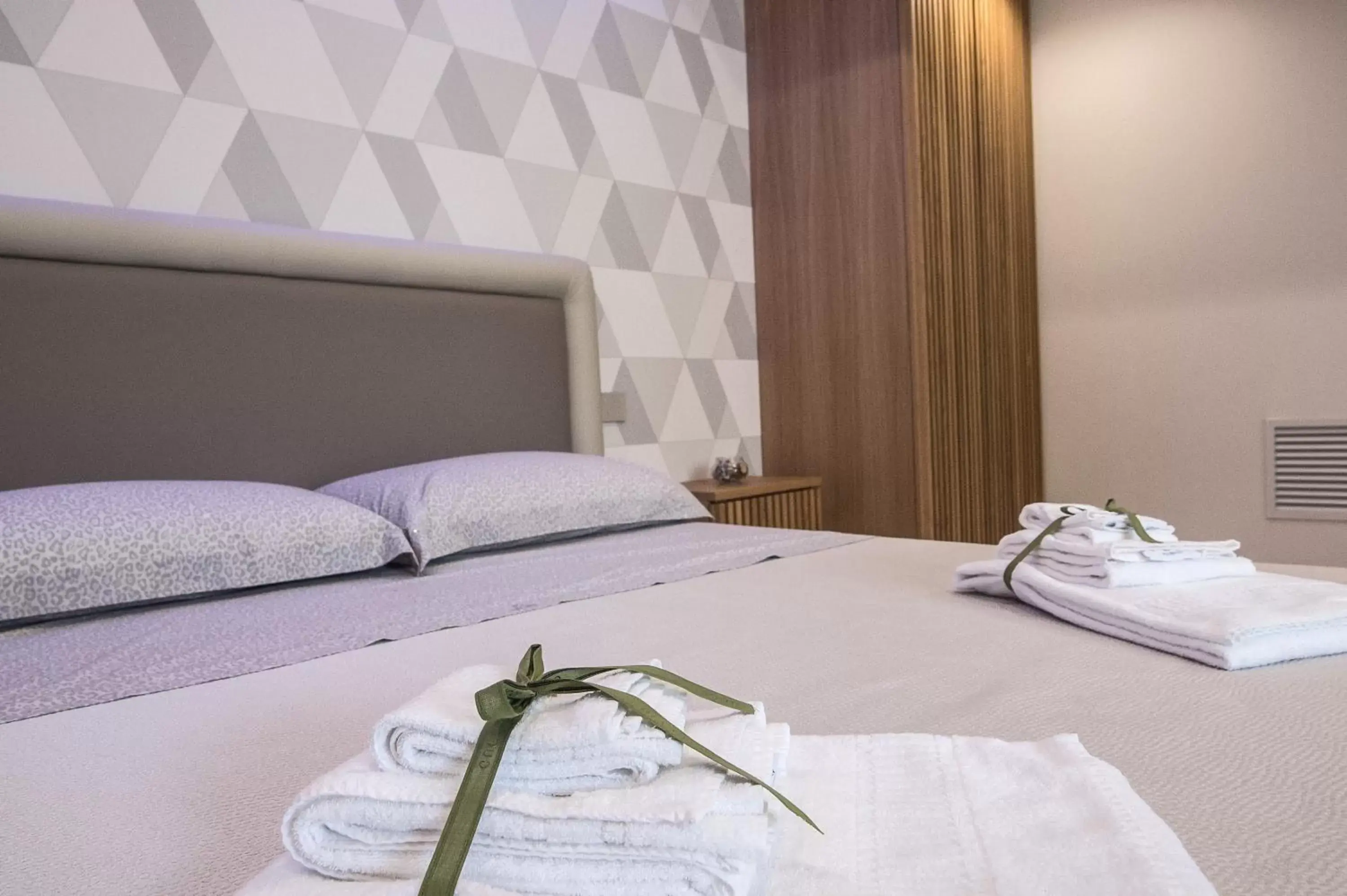 Bed in SG Suite & Spa Amalfi Coast