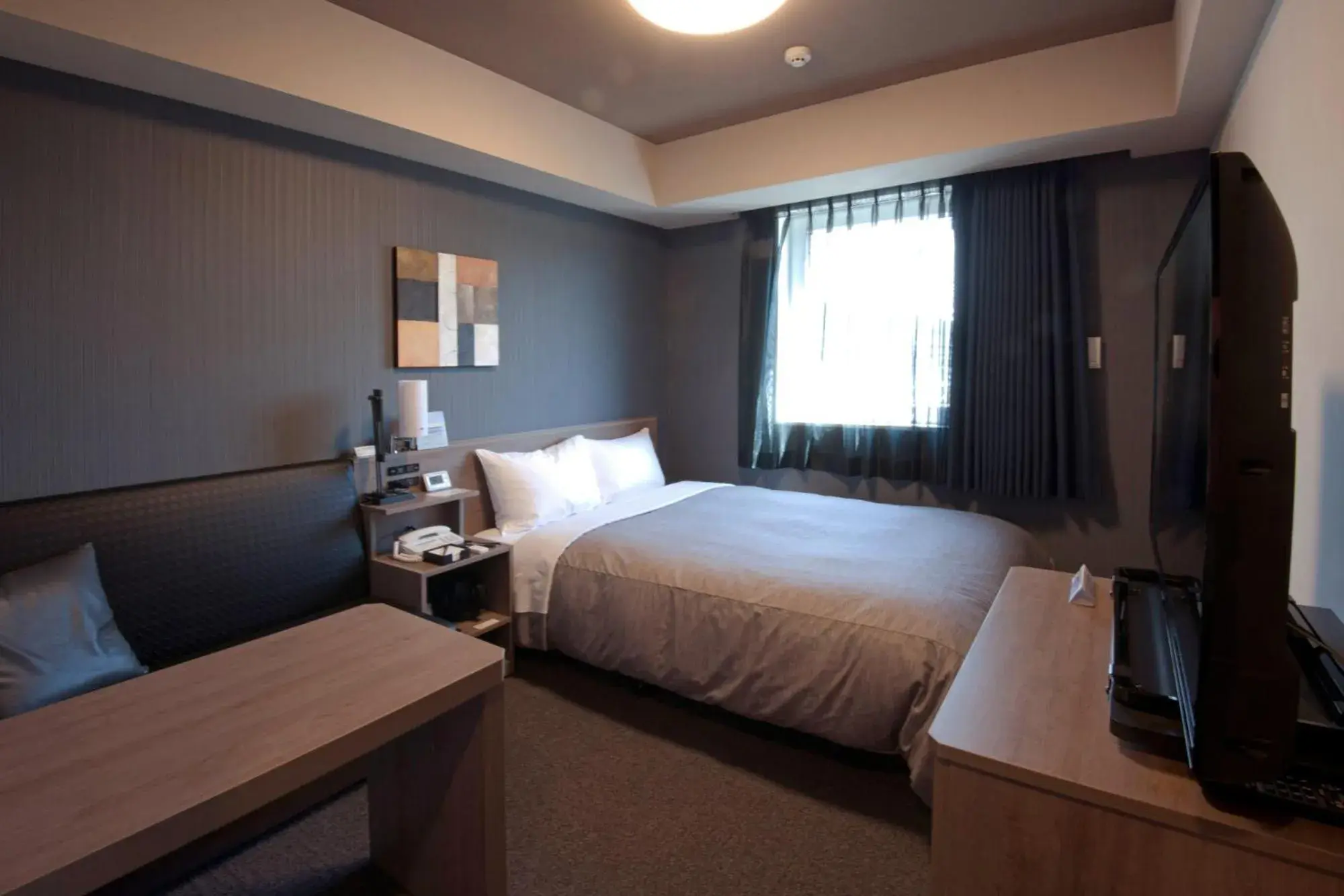 Photo of the whole room, Bed in Hotel Route-Inn Yamagata South - in front of University Hospital -