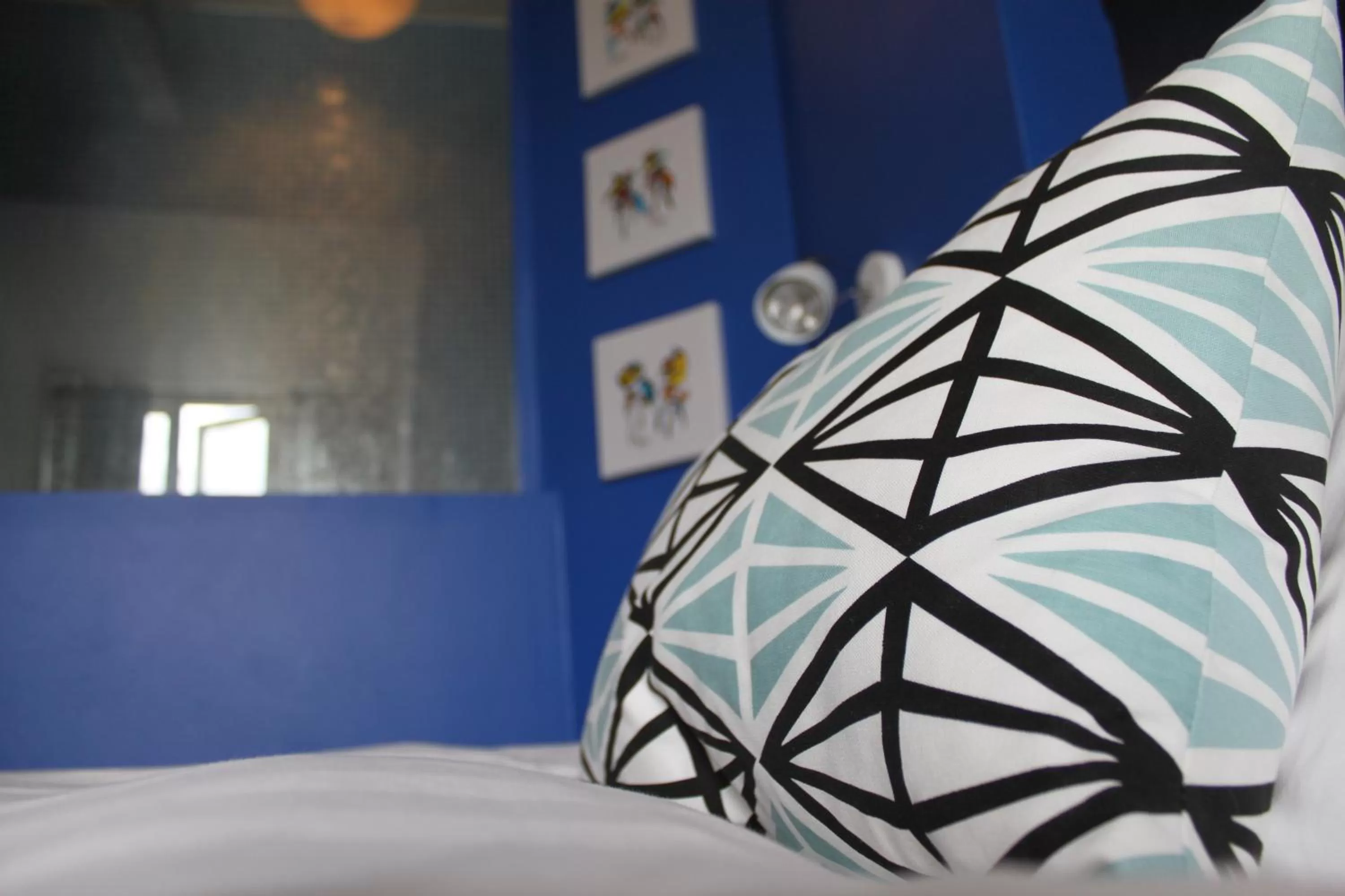 Decorative detail, Bed in Magles Smiley Inn