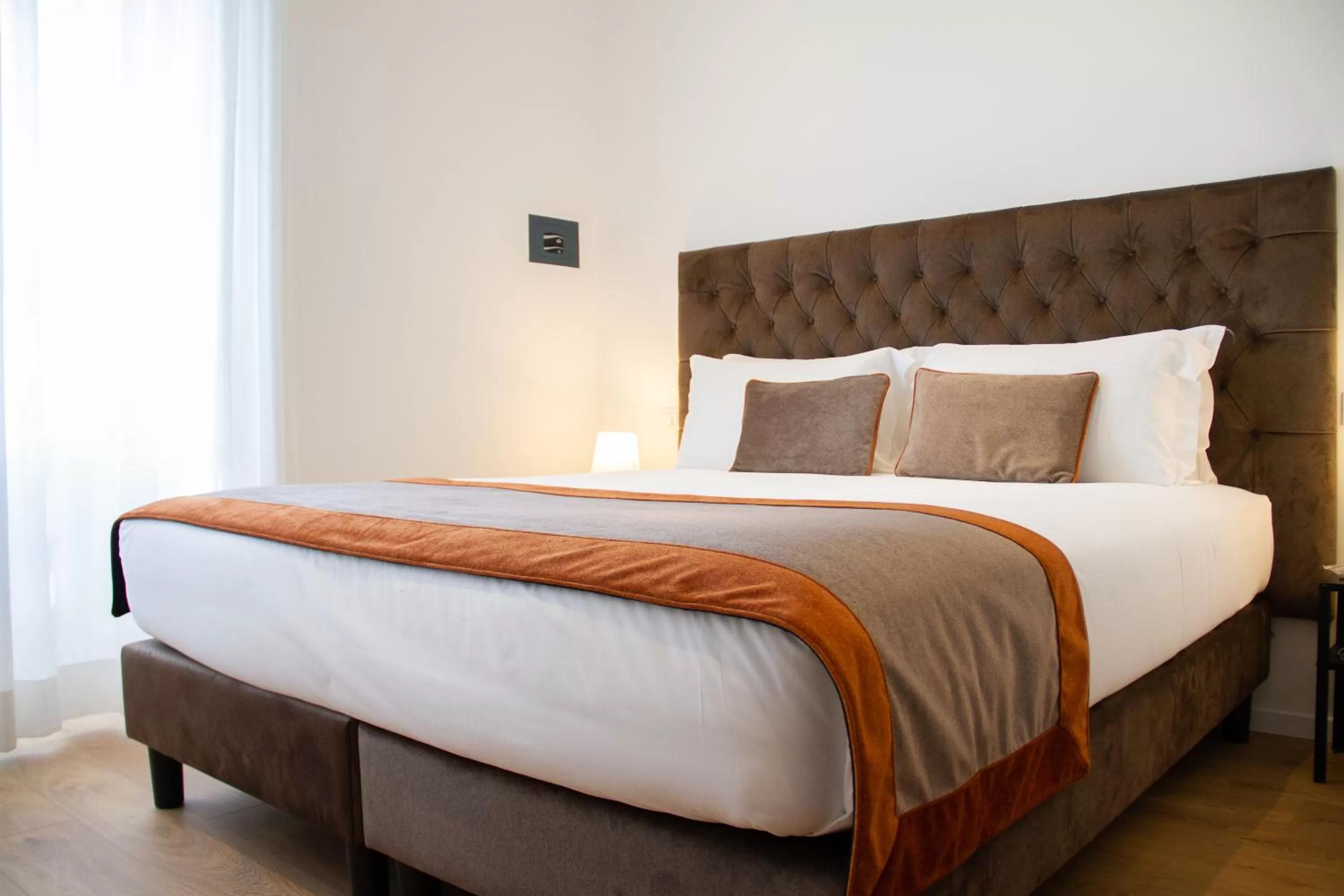 Bed in Michelangelo Vatican Rooms