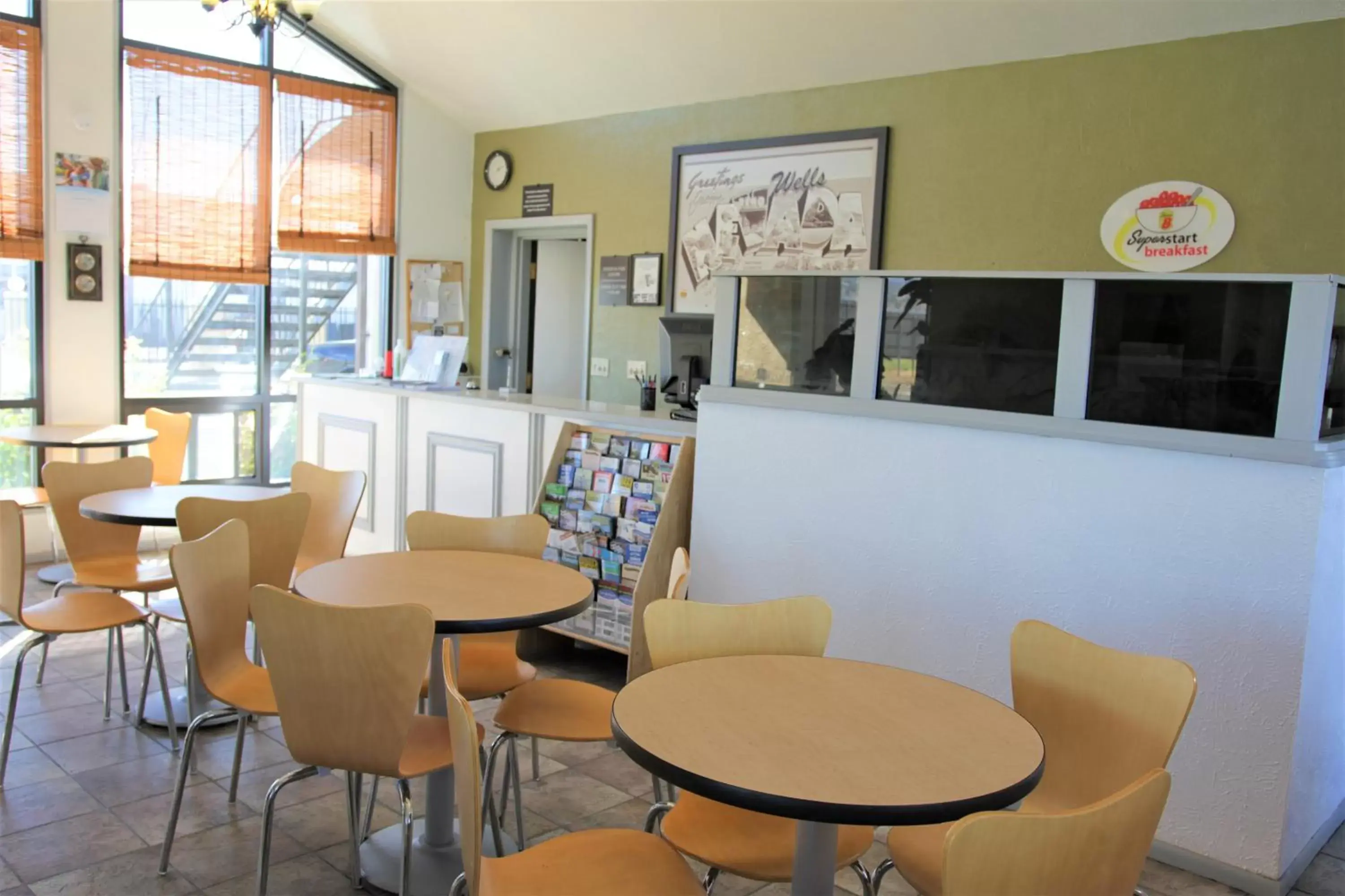 Lobby or reception in Super 8 by Wyndham Wells Lobby or reception in Super 8 by Wyndham Wells