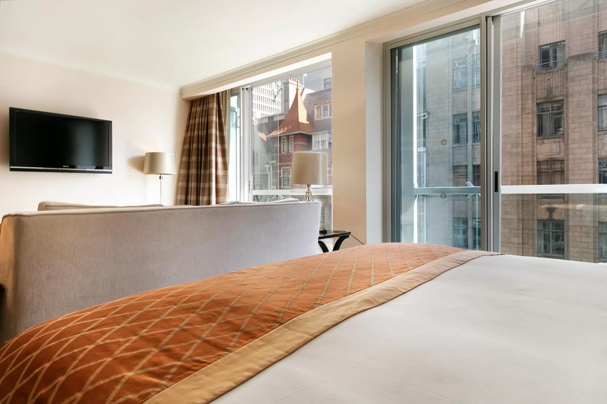 Bed in Taj Executive Suites, Private Residence