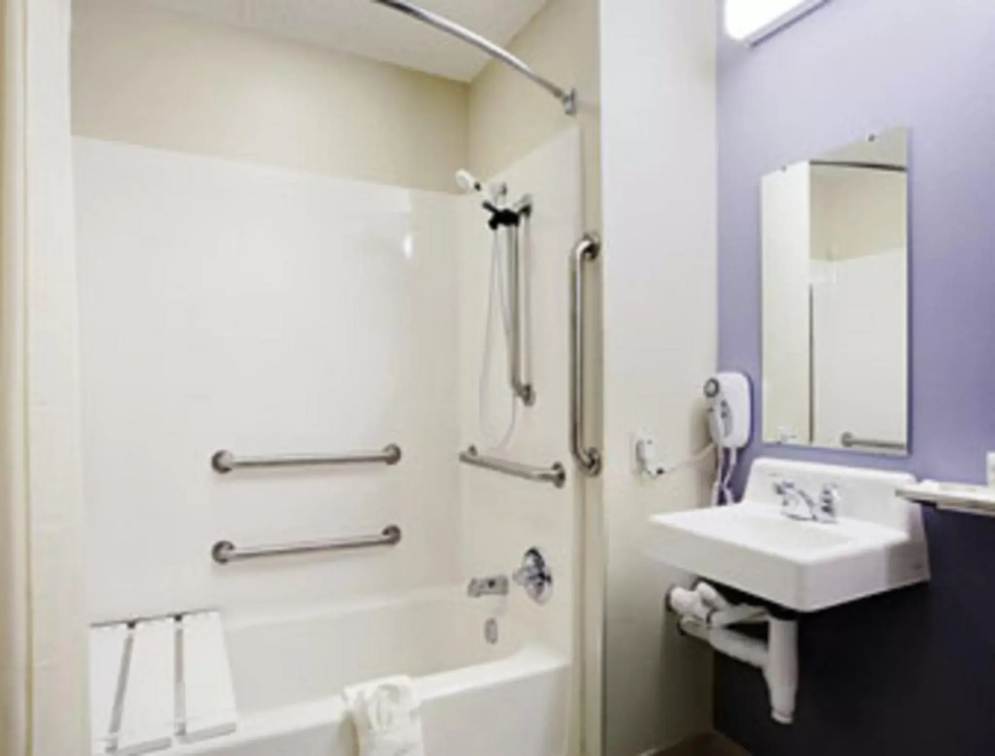 Bathroom in Microtel Inn & Suites by Wyndham Denver Airport