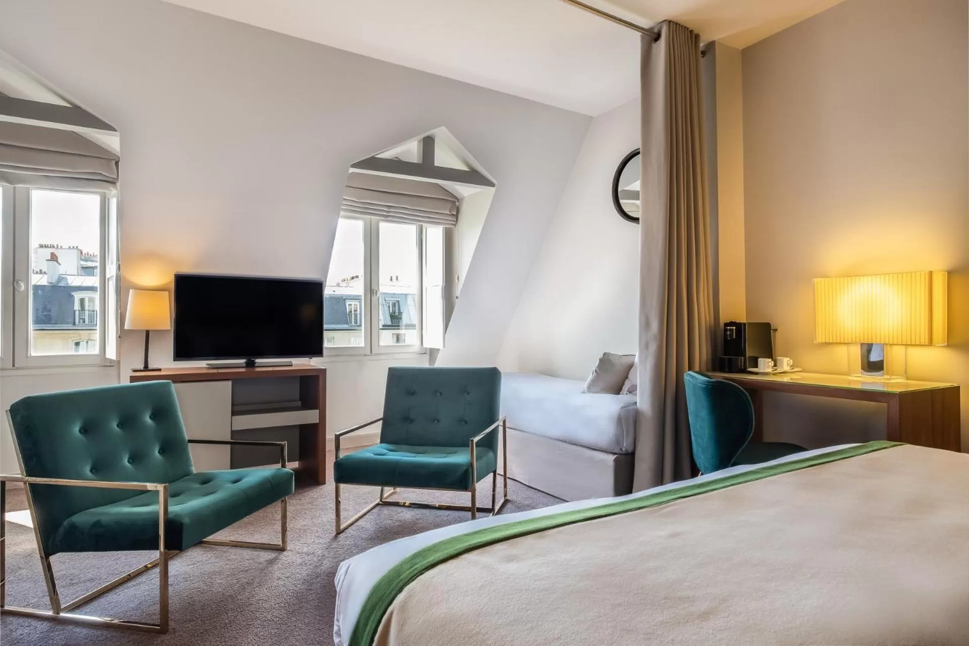 Photo of the whole room, Bed in Hôtel Le Tourville by Inwood Hotels