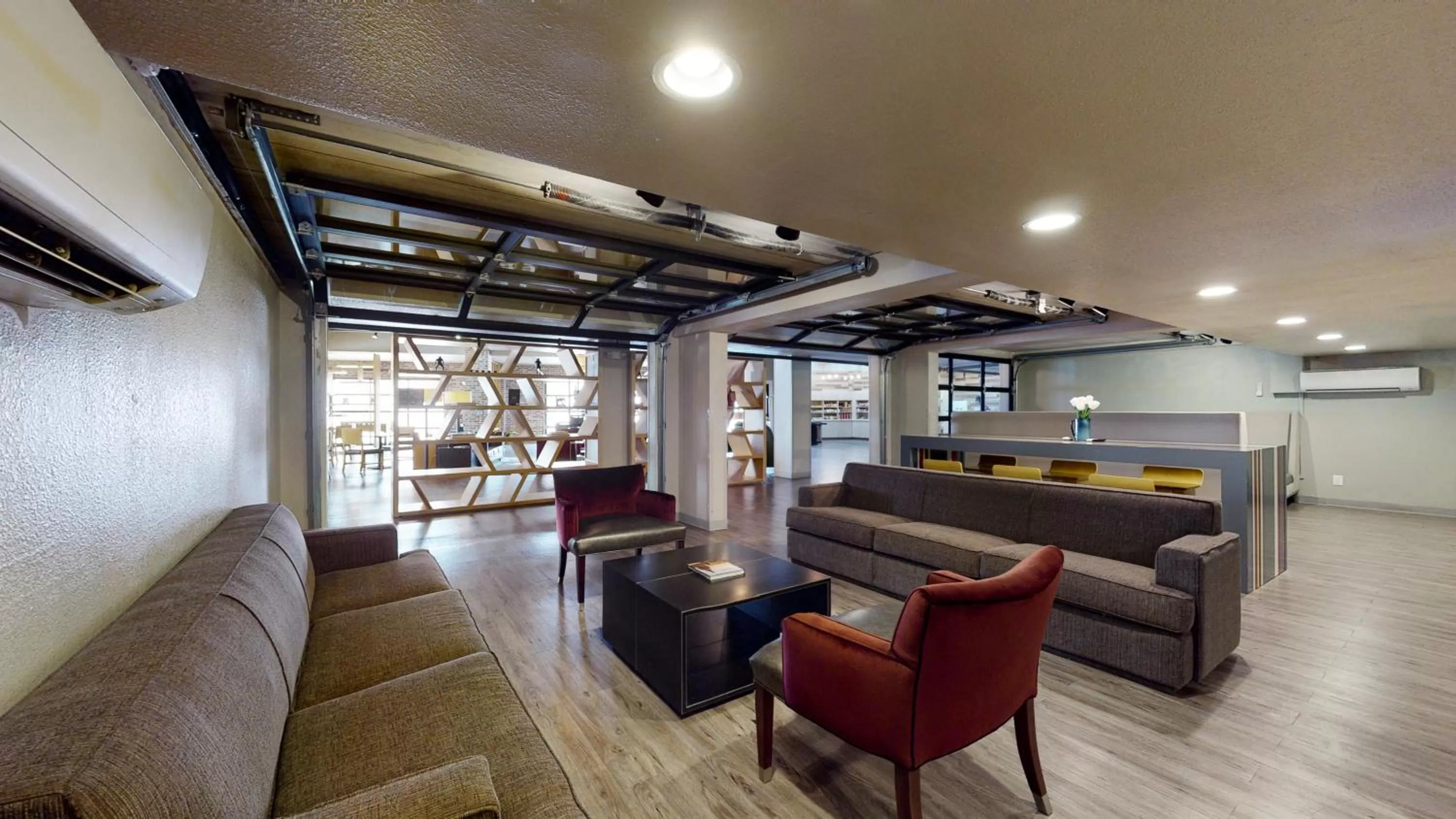 Lobby or reception in voco College Station Aggieland by IHG