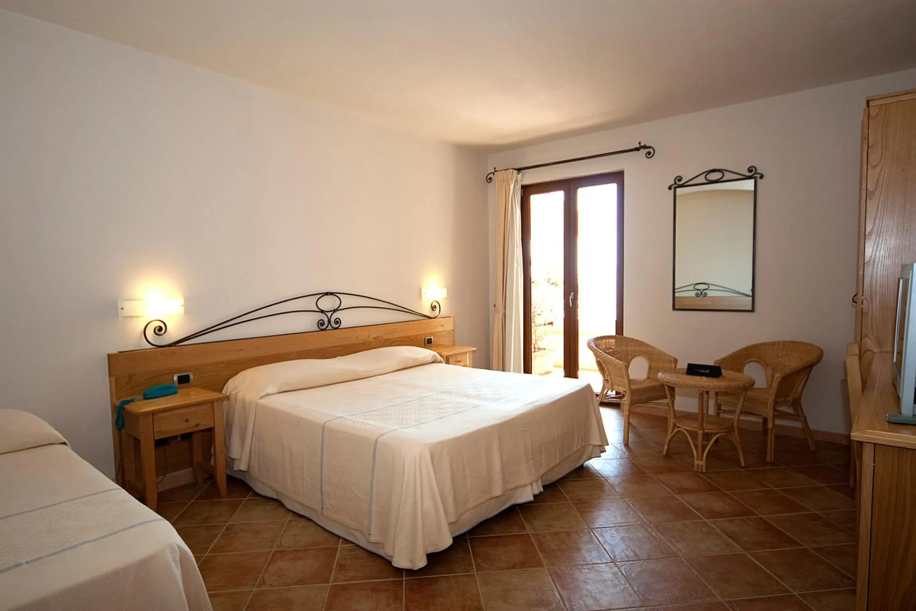 Photo of the whole room, Bed in Hotel Villa Gustui Maris