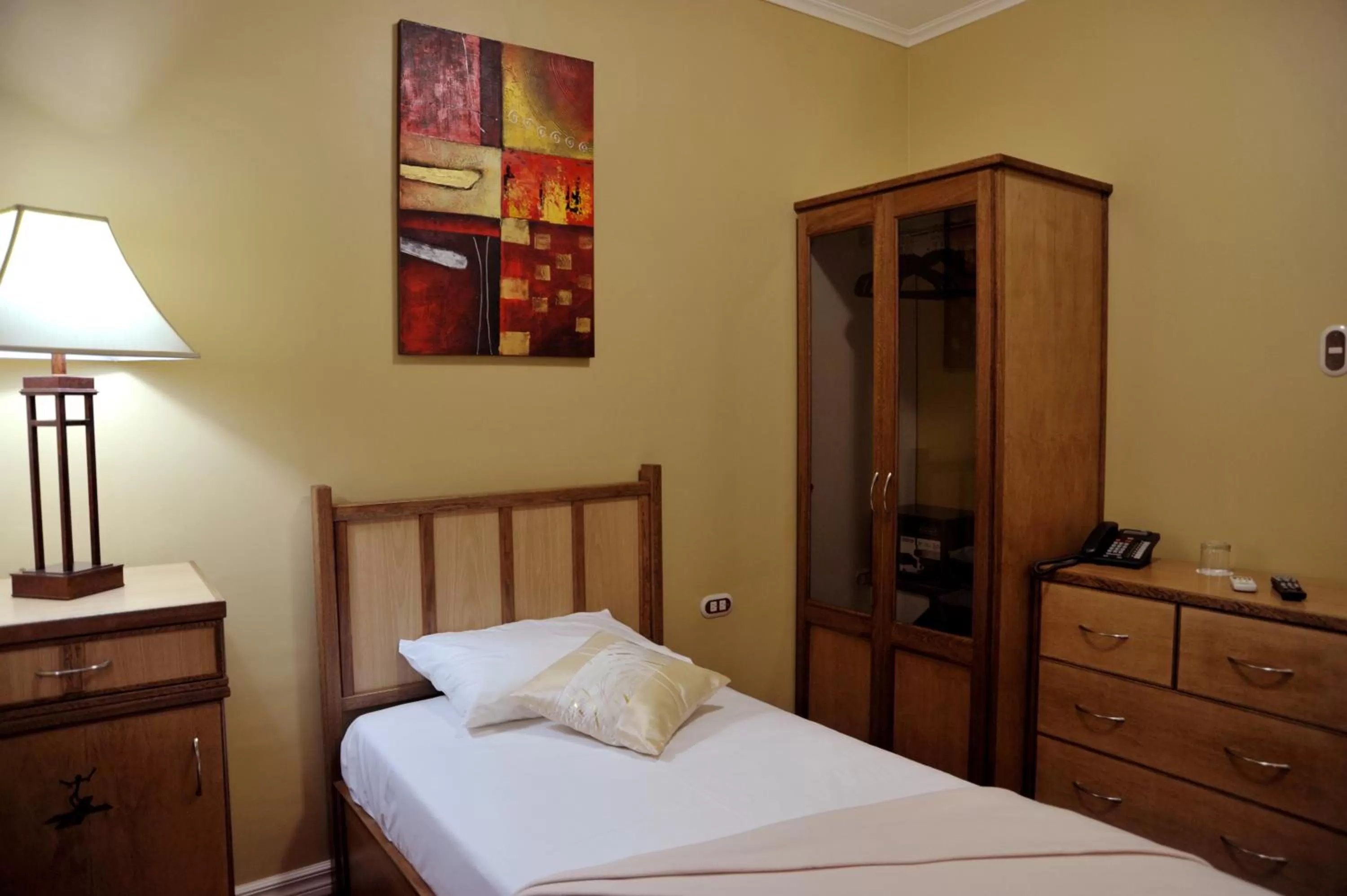 Bed in Culture Crossroads Inn