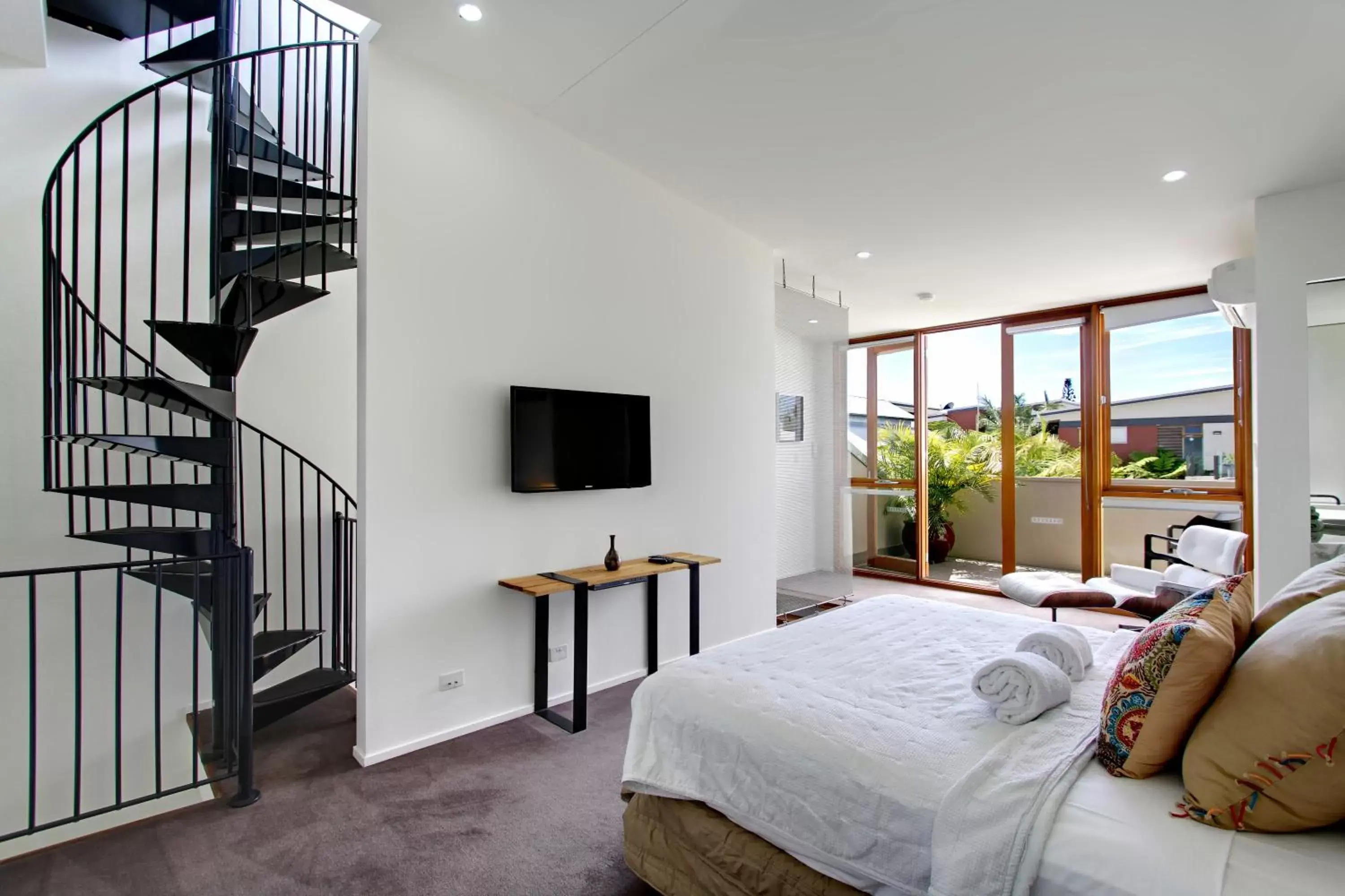 Bedroom in Byron Butter Factory Apartments