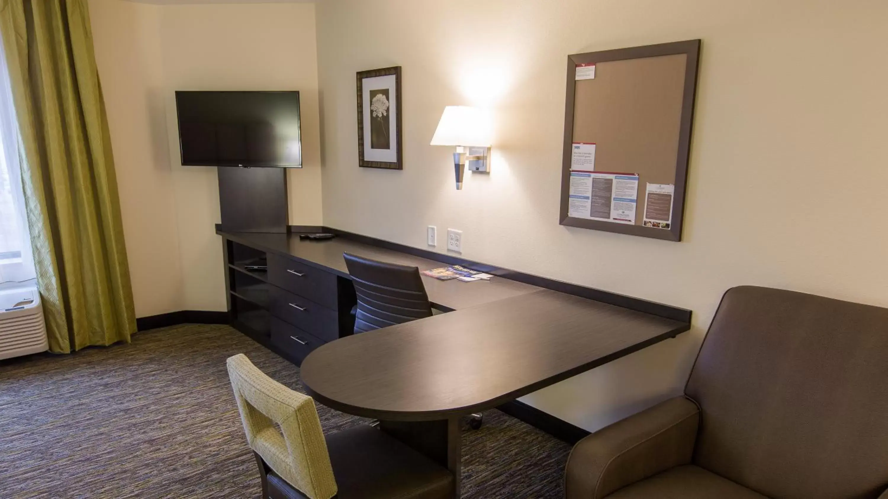 Photo of the whole room, TV/Entertainment Center in Candlewood Suites Overland Park W 135th St, an IHG Hotel