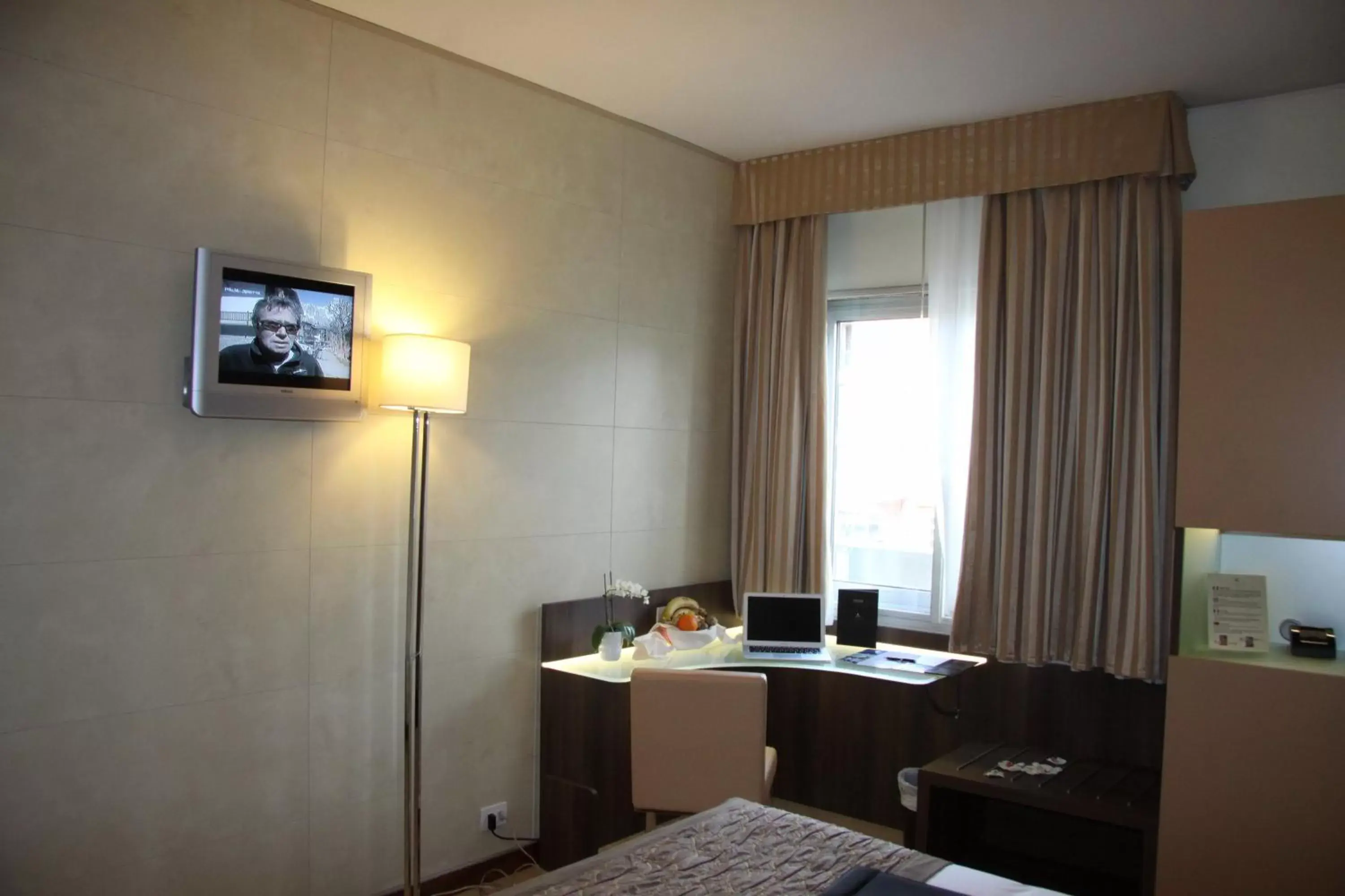 Photo of the whole room, TV/Entertainment Center in LH Hotel Sirio Venice
