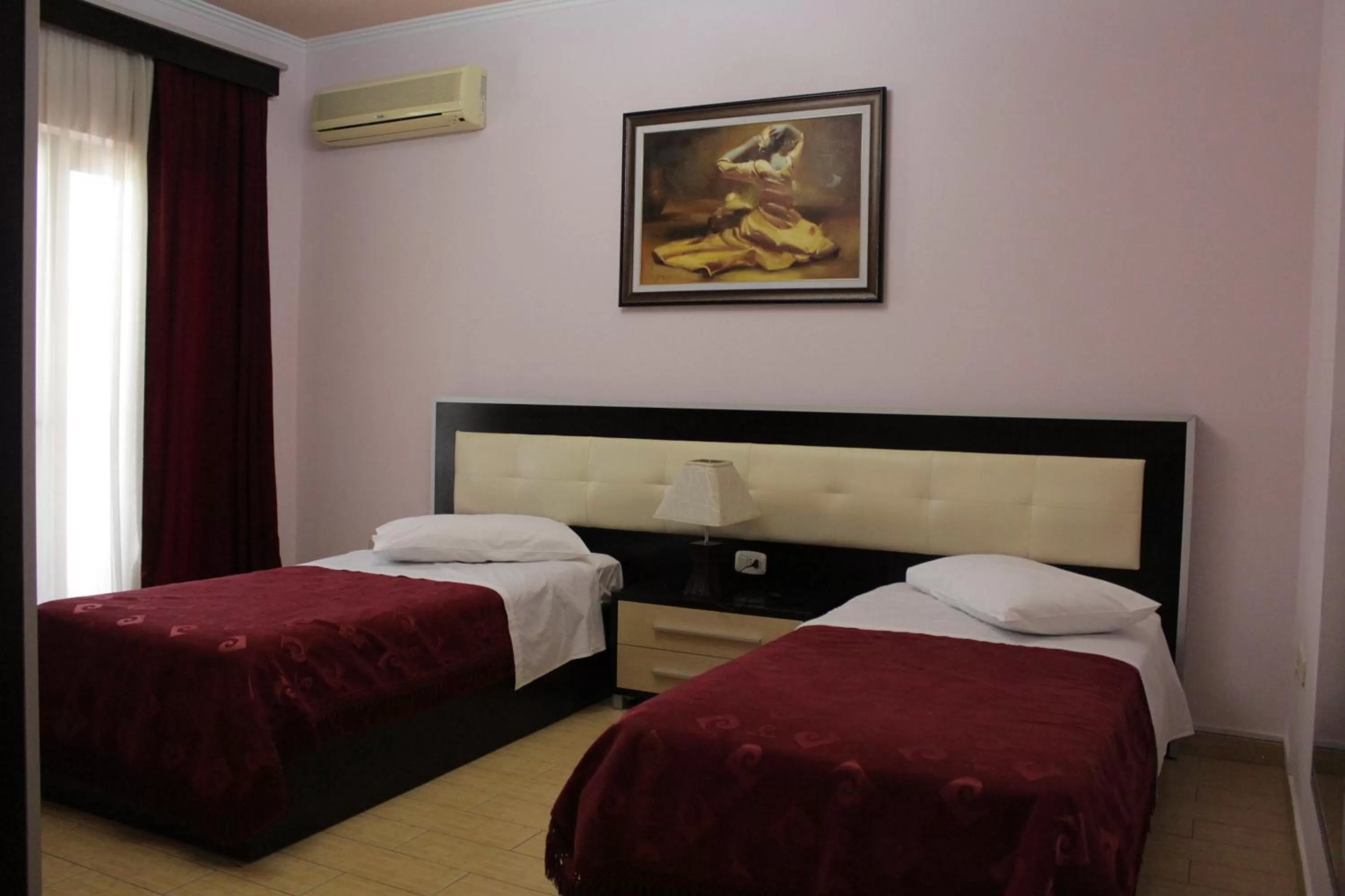 Bed in Fieri International Hotel