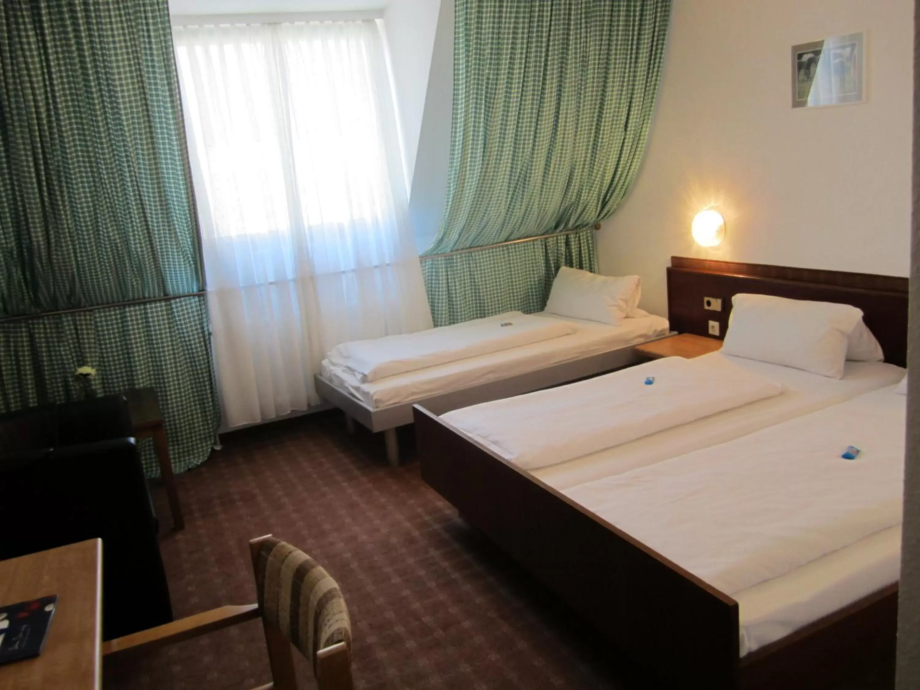 Bed in Hotel Deutschmeister