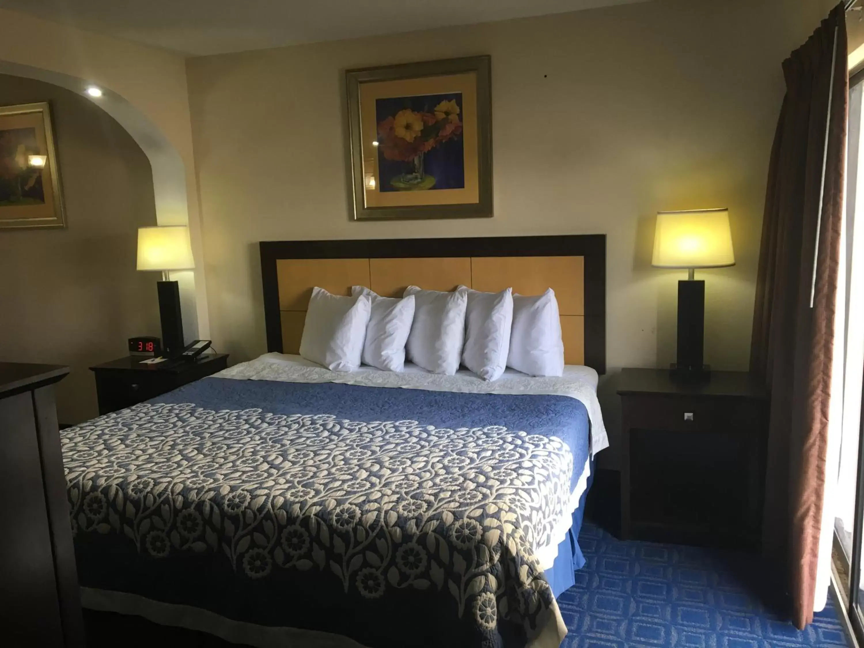 Bed in Days Inn & Suites by Wyndham Tampa near Ybor City
