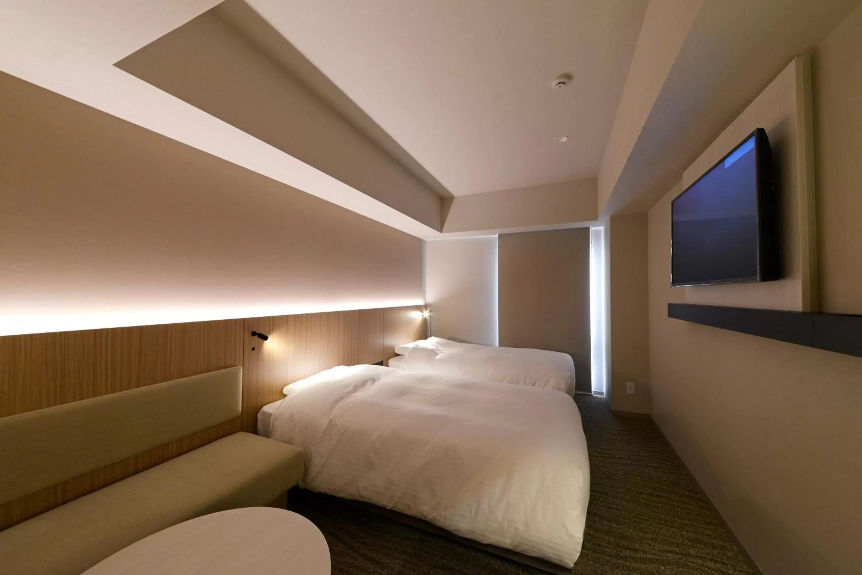 Bed in JR Inn Sapporo-eki Minami-guchi