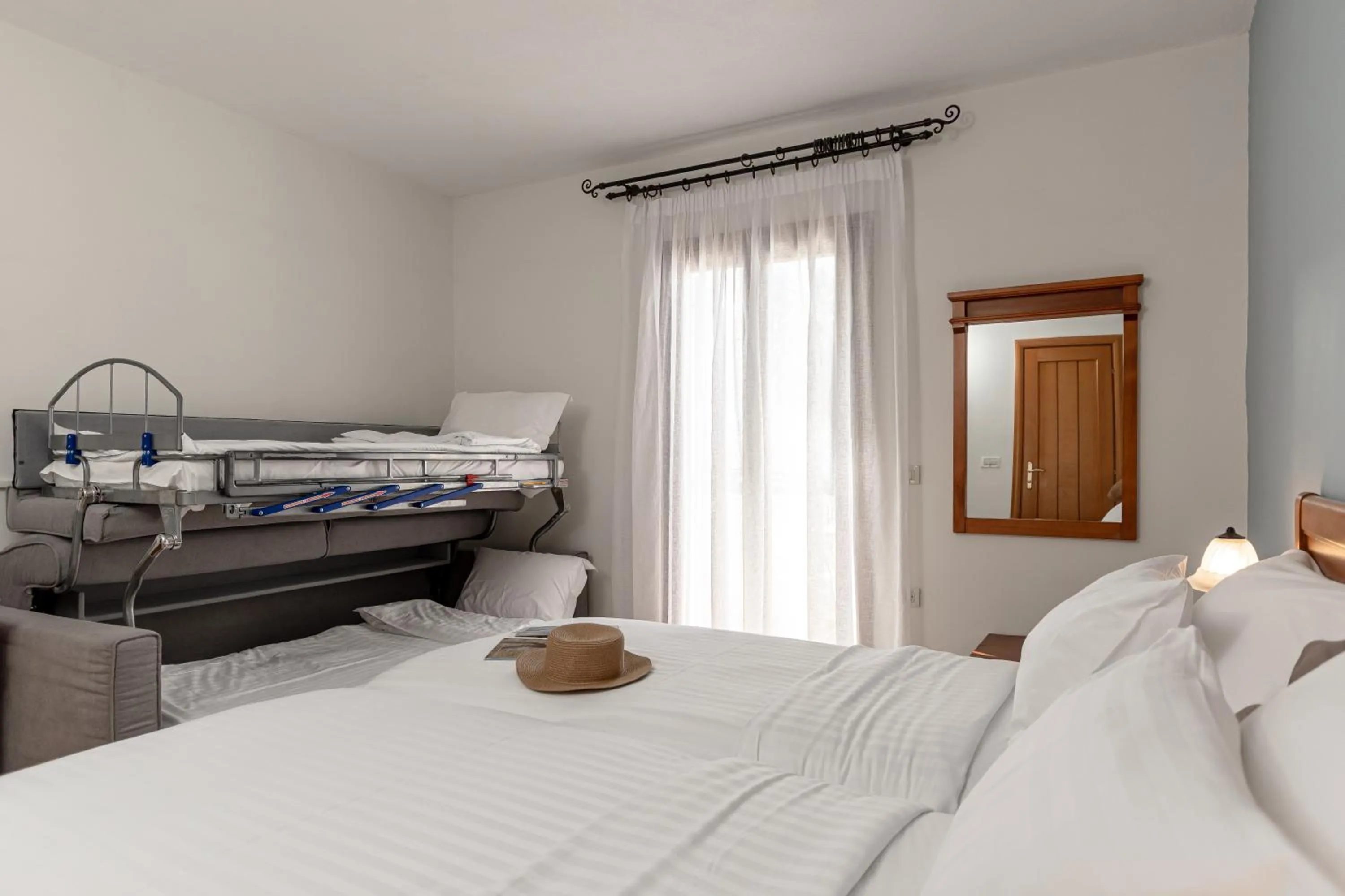 Bed in Naxos Resort Beach Hotel