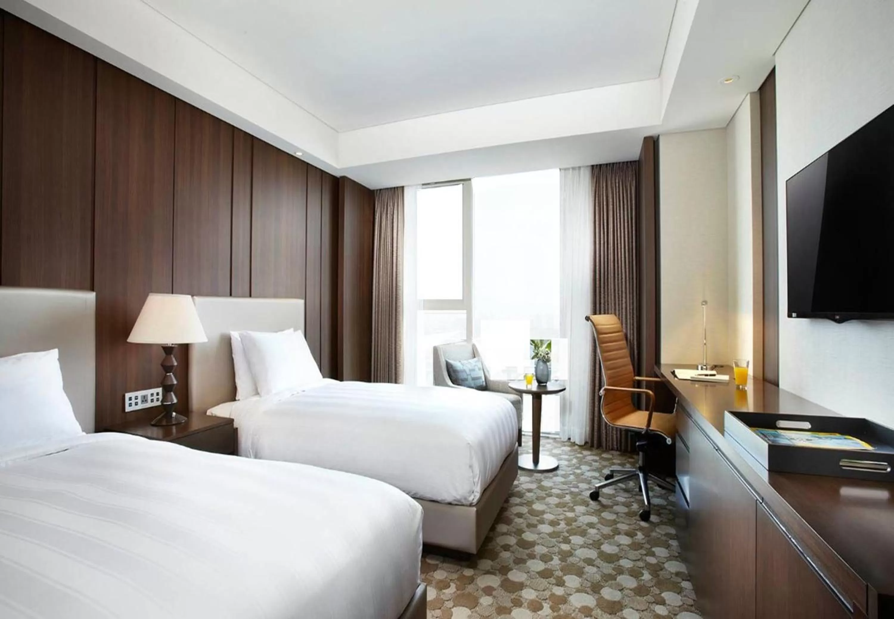 Bed in LOTTE CITY HOTEL Daejeon