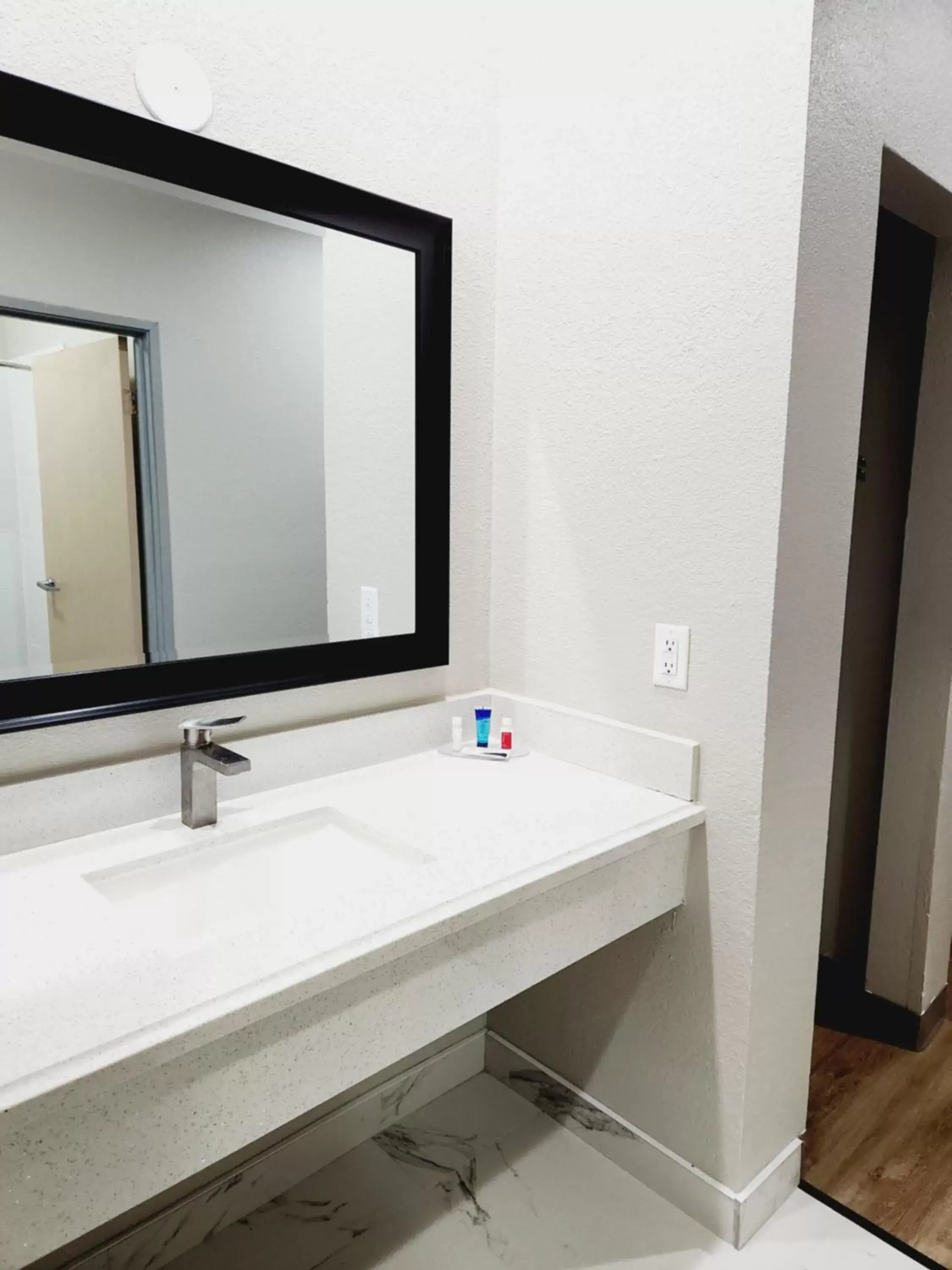 Bathroom in Days Inn & Suites by Wyndham Corpus Christi Central