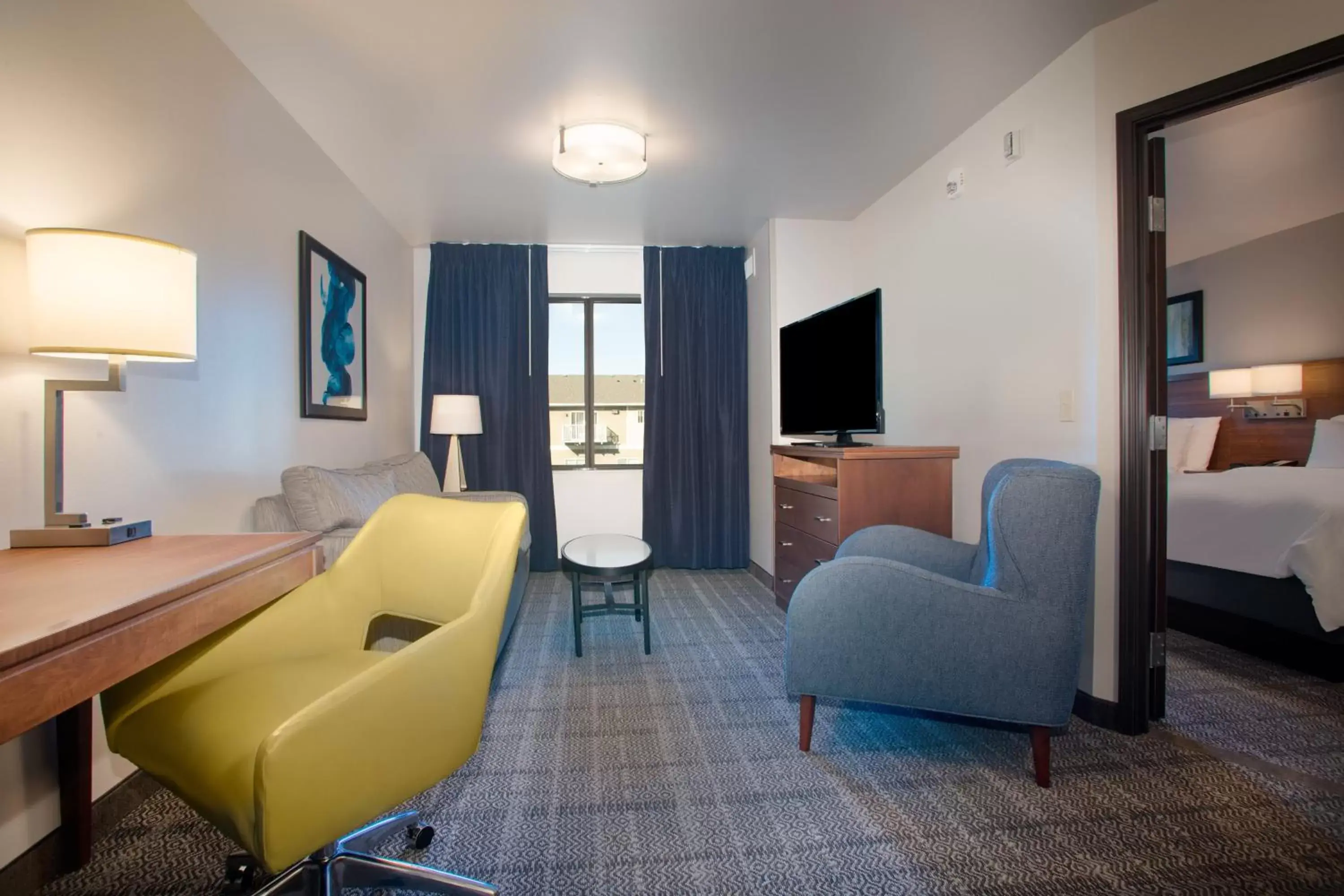 Photo of the whole room, Seating Area in Staybridge Suites - Sioux Falls Southwest, an IHG Hotel