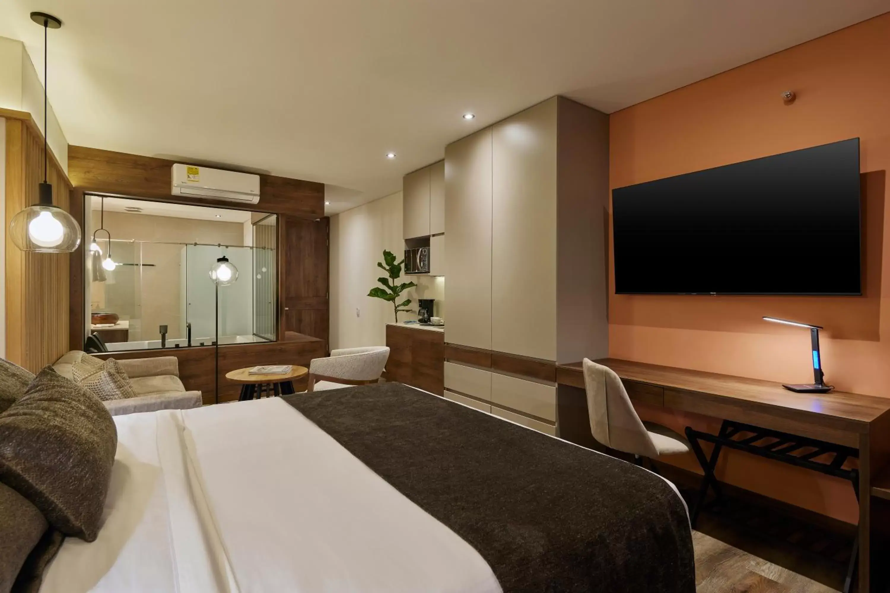 Communal lounge/ TV room, Bed in Blues Suites Medellín Communal lounge/ TV room, Bed in Blues Suites Medellín