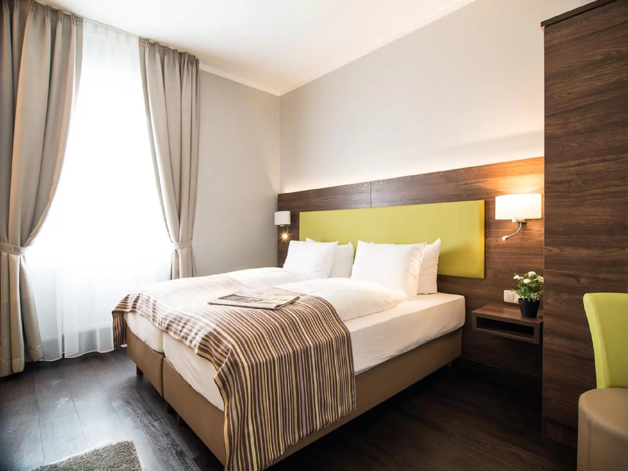 Bed in BATU Apart Hotel