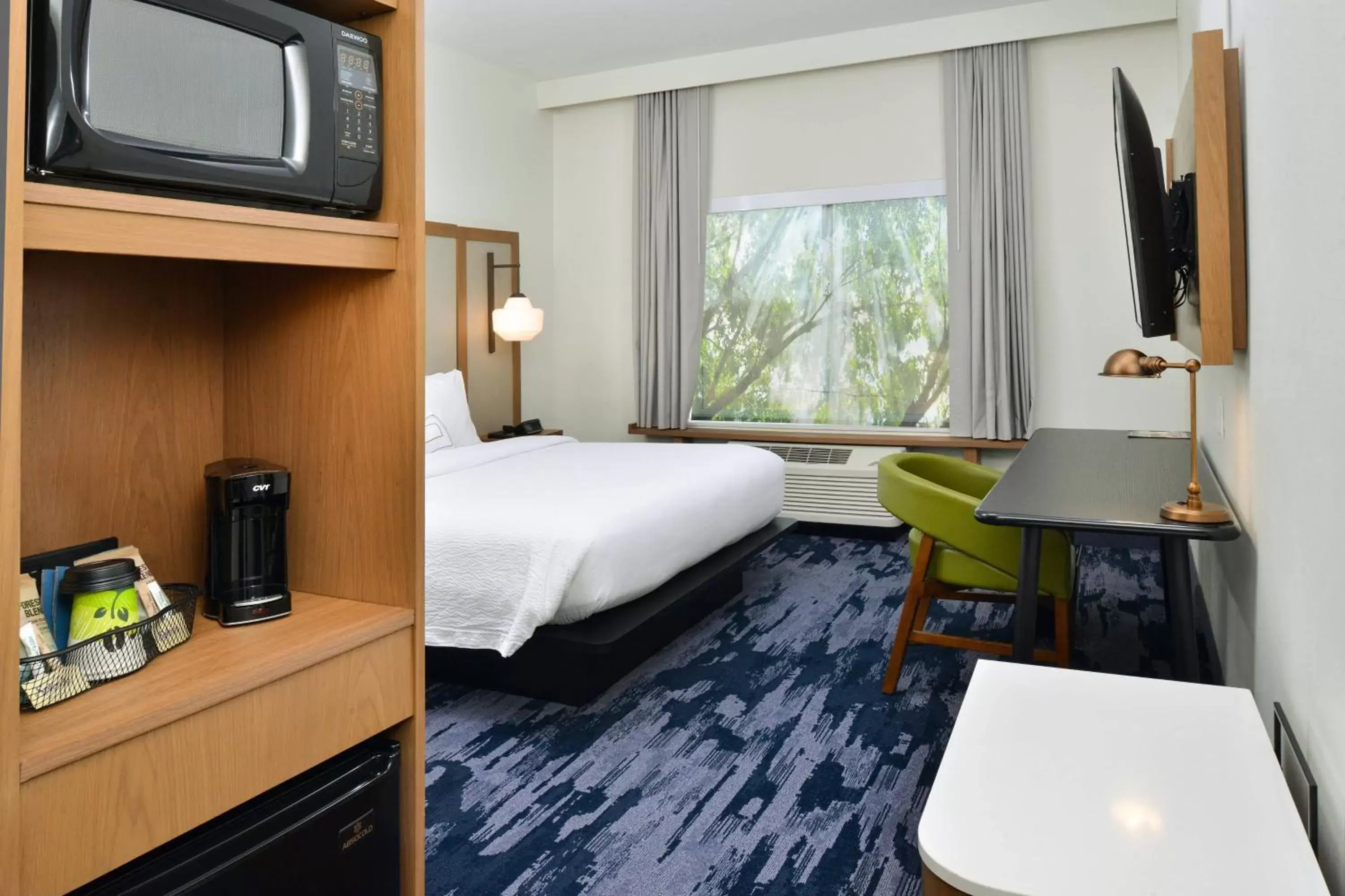 Photo of the whole room, Bed in Fairfield Inn & Suites by Marriott Charlotte University Research Park