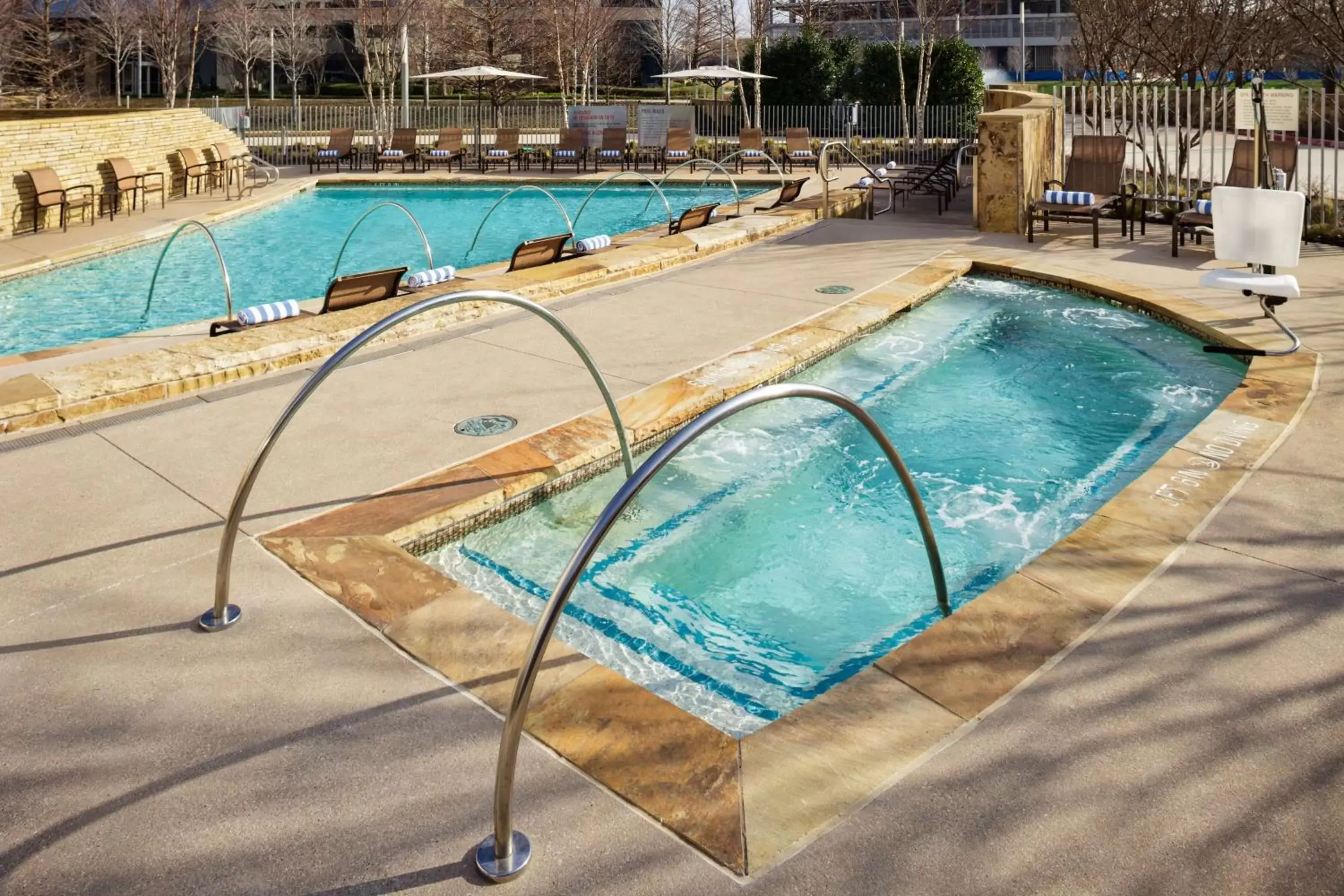 Property building, Swimming Pool in Hilton Dallas/Plano Granite Park