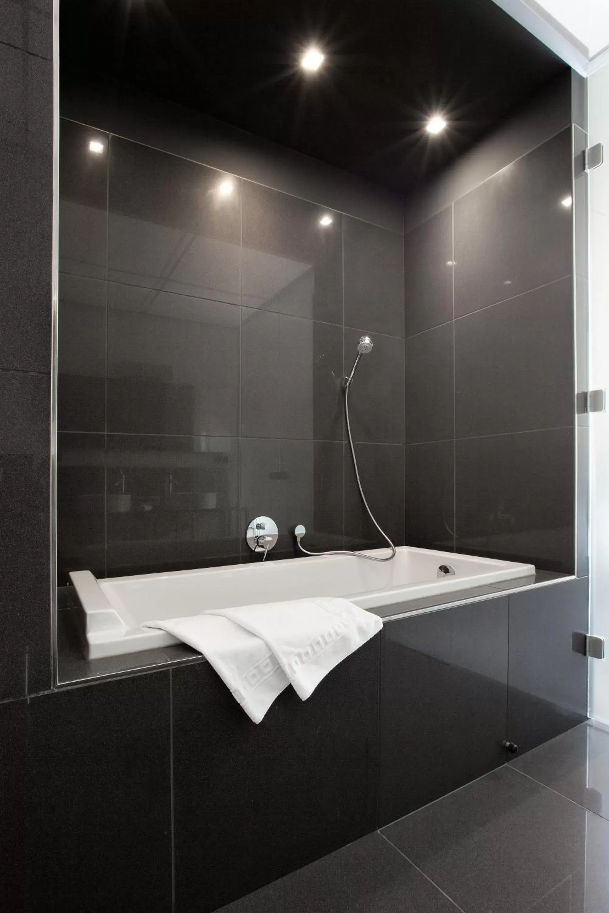 Bathroom in Old Town Square Residence by Emblem