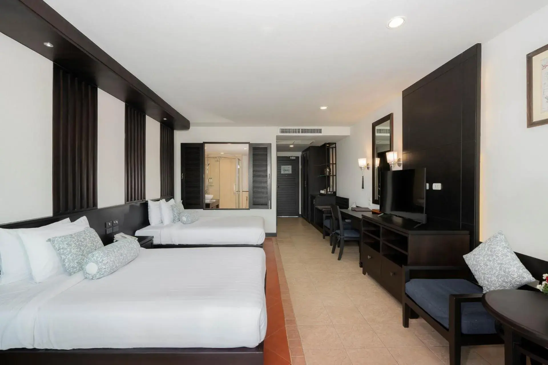 Bedroom in Ravindra Beach Resort & Spa - SHA Extra Plus