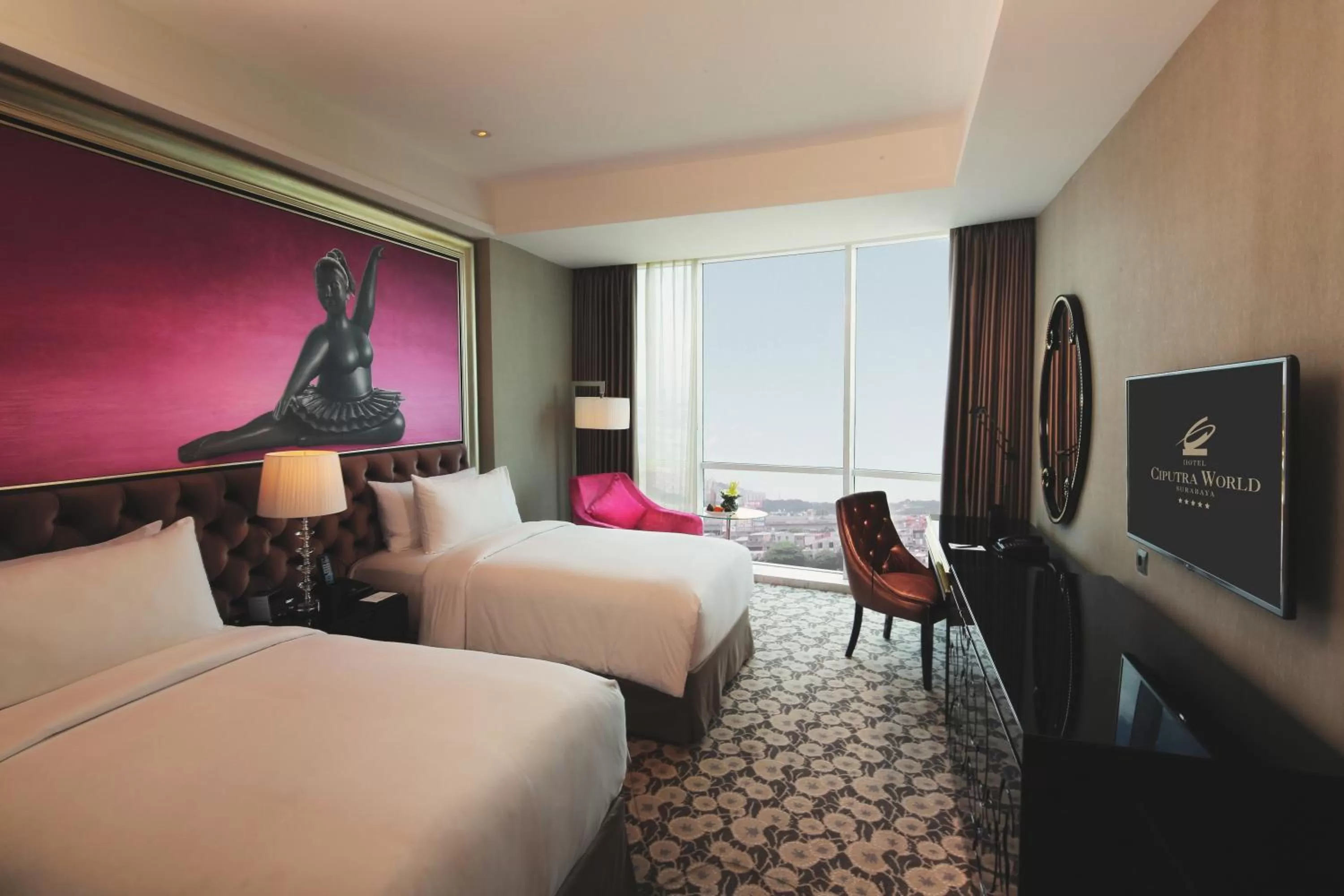 Bed in Hotel Ciputra World Surabaya managed by Swiss-Belhotel International