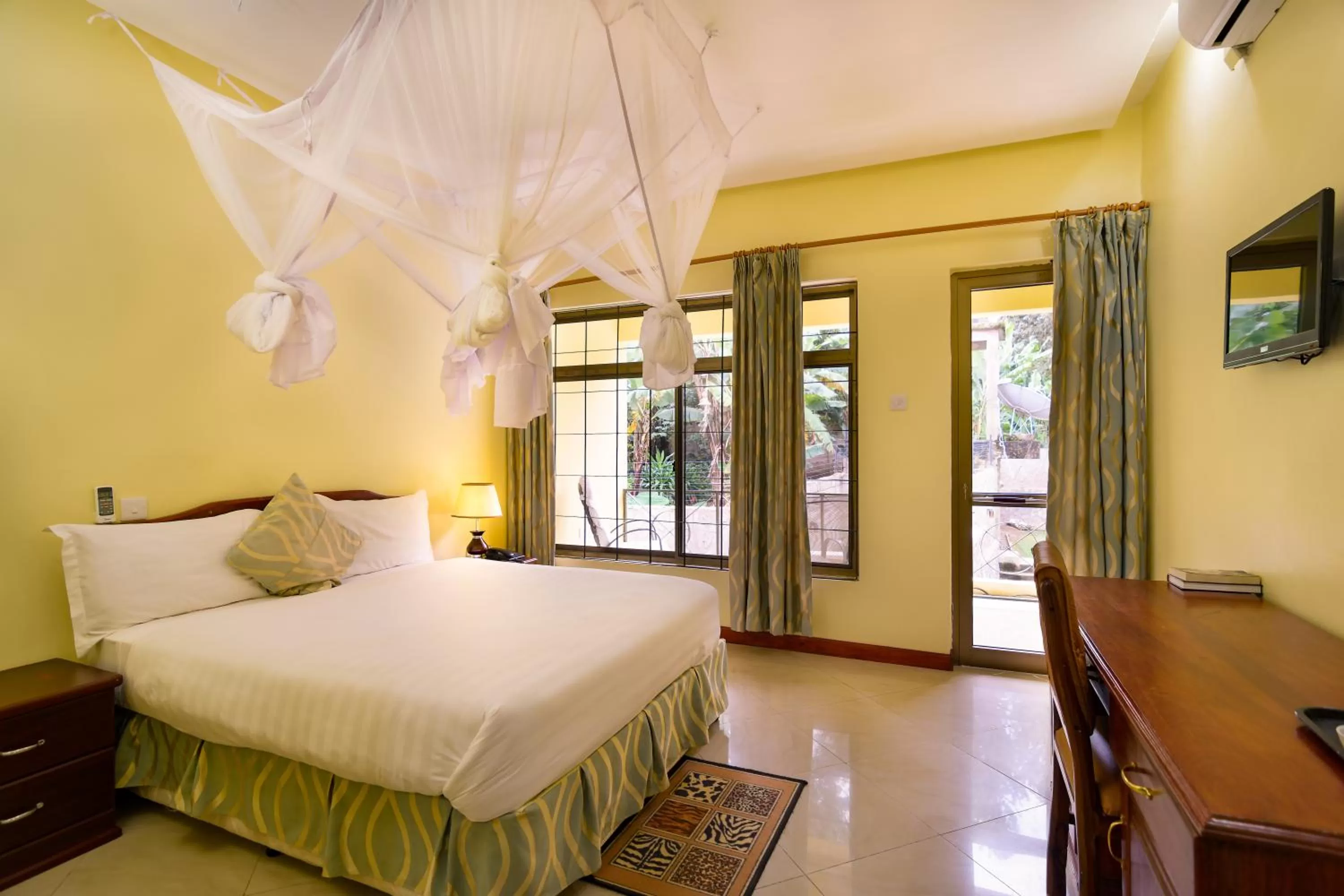 Bed in Mvuli Hotels Arusha