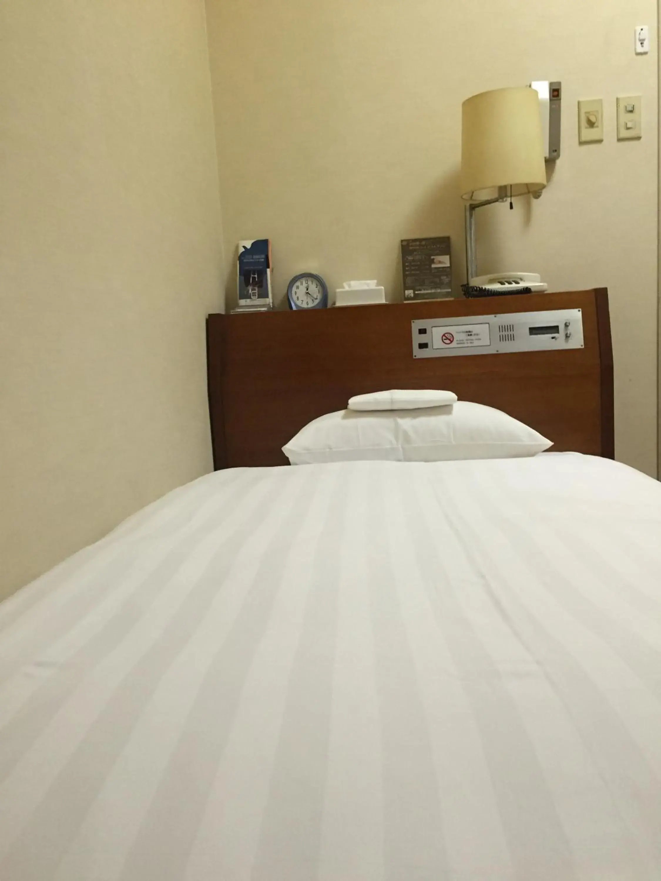 Bed in SkyHeart Hotel Kawasaki