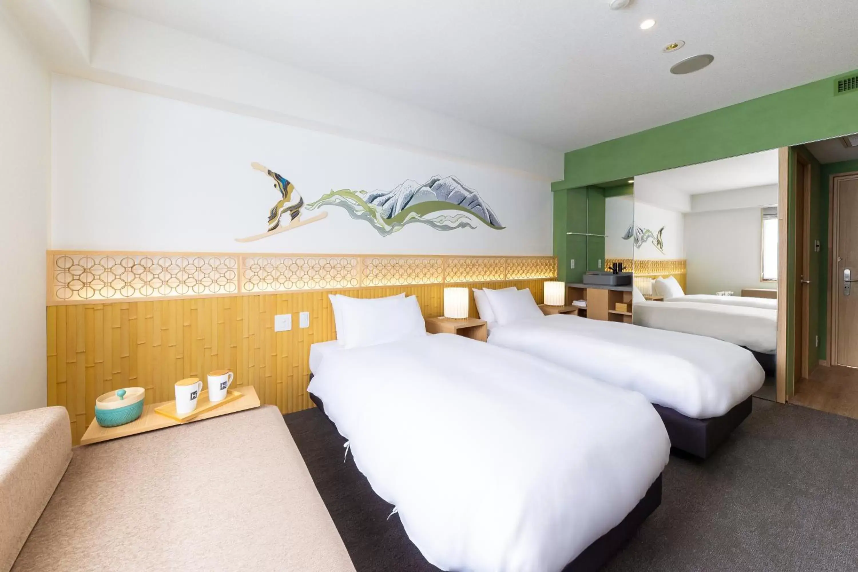 Bed in THE HAPPO by Hakuba Hotel Group