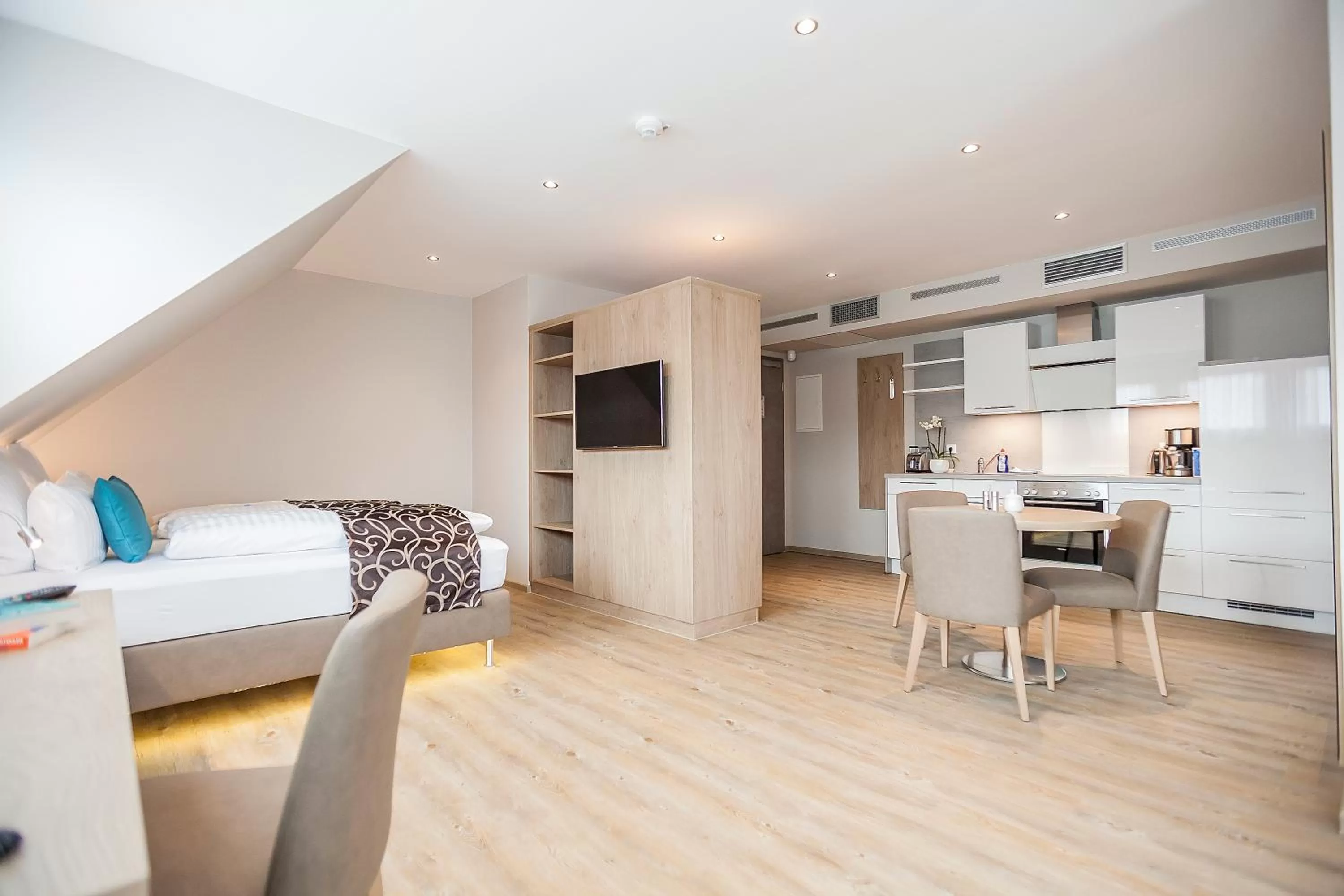 Photo of the whole room, Bed in AKZENT Hotel Villa Saxer