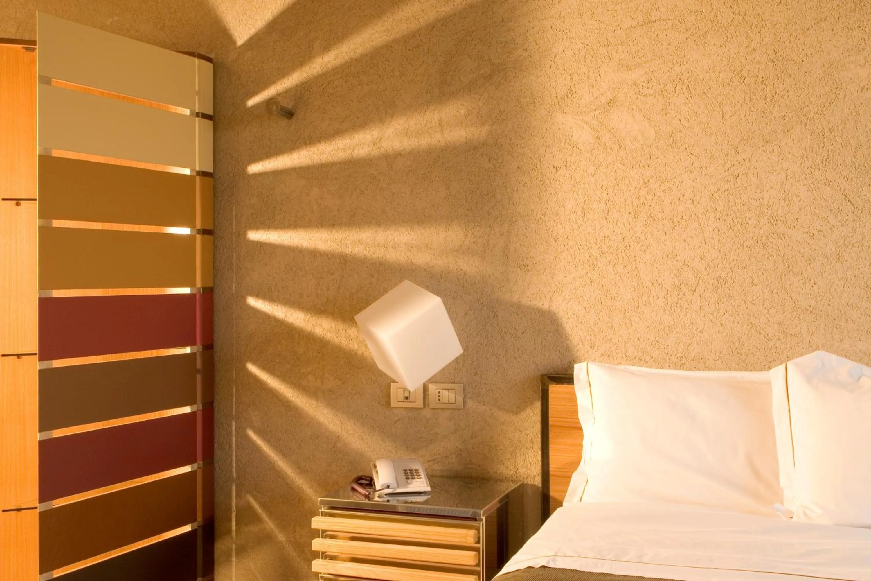 Decorative detail, Bed in Albergo Cantine Ascheri