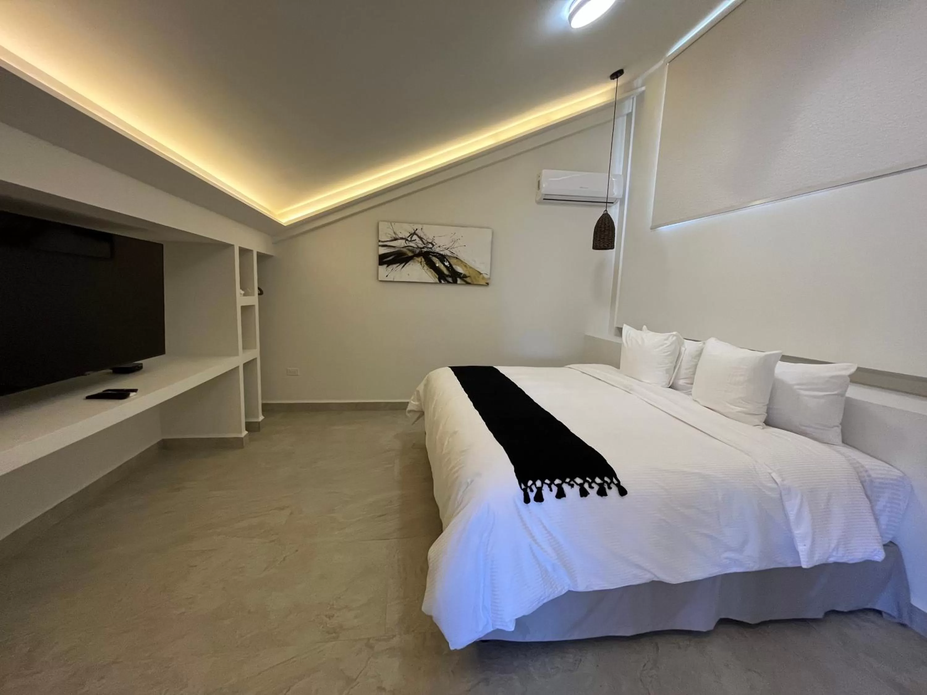 Bed in Marisol Hotel Boutique