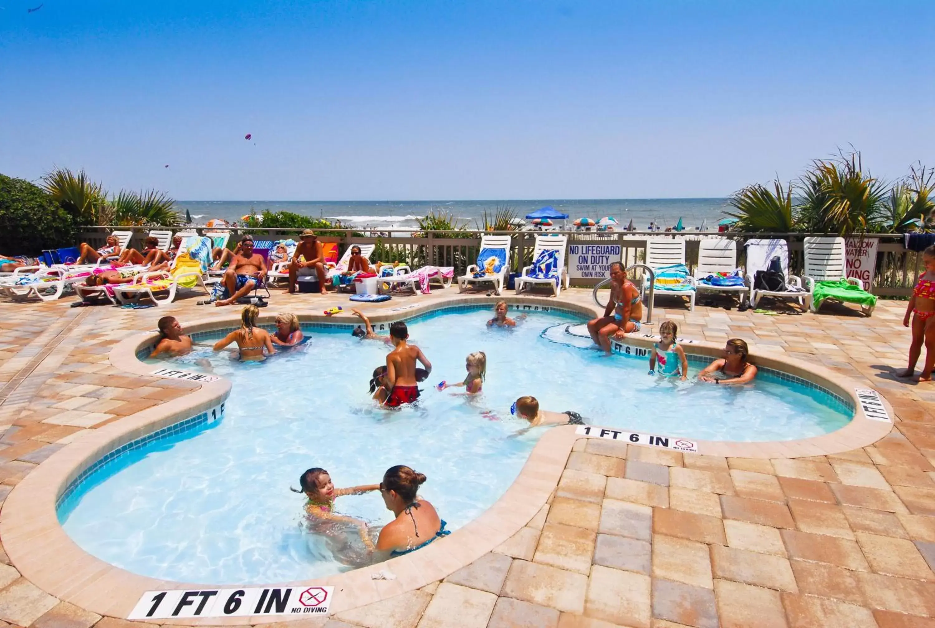 Swimming pool, Guests in Coral Beach Resort