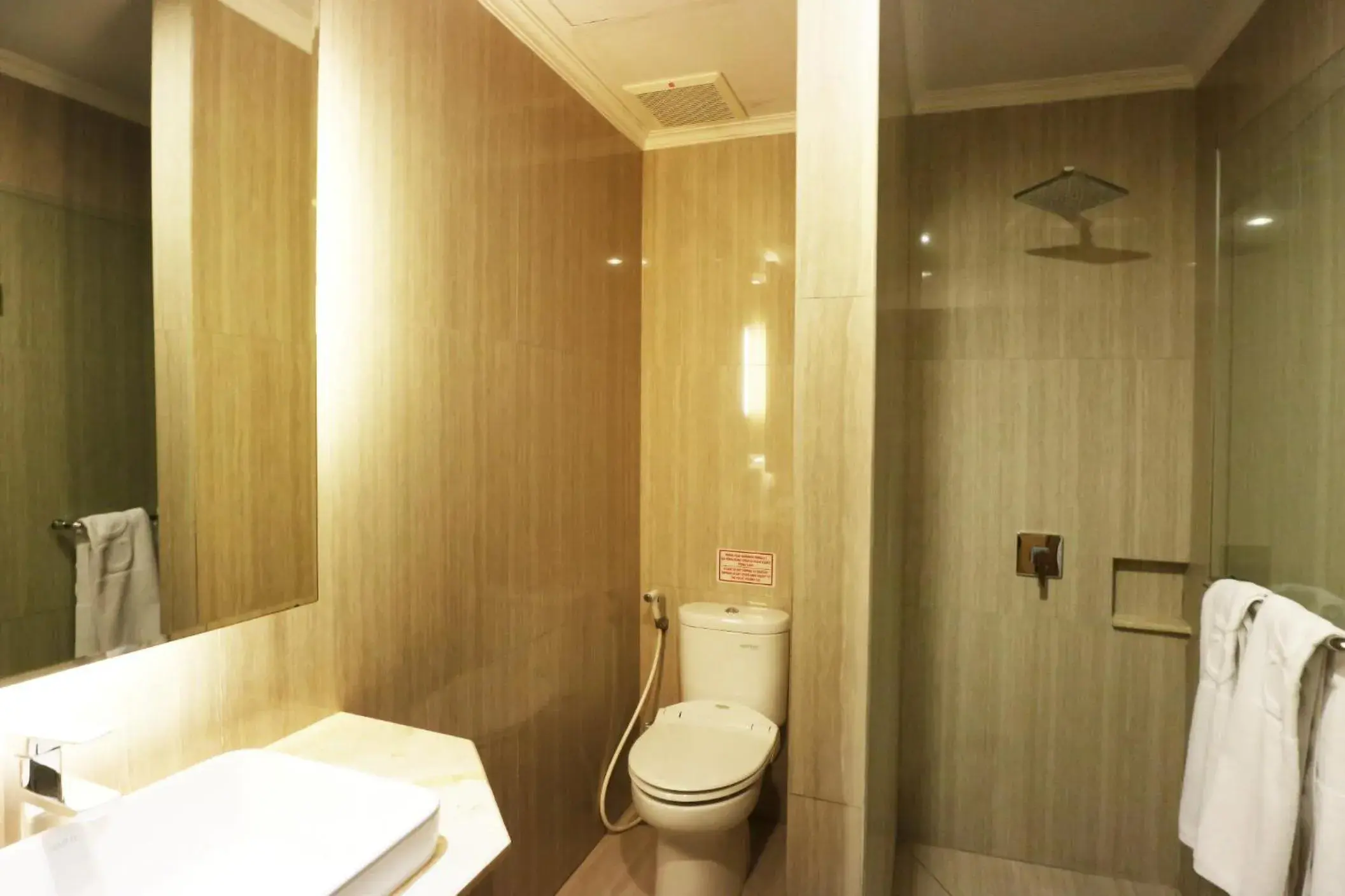 Bathroom in Coins Hotel Jakarta