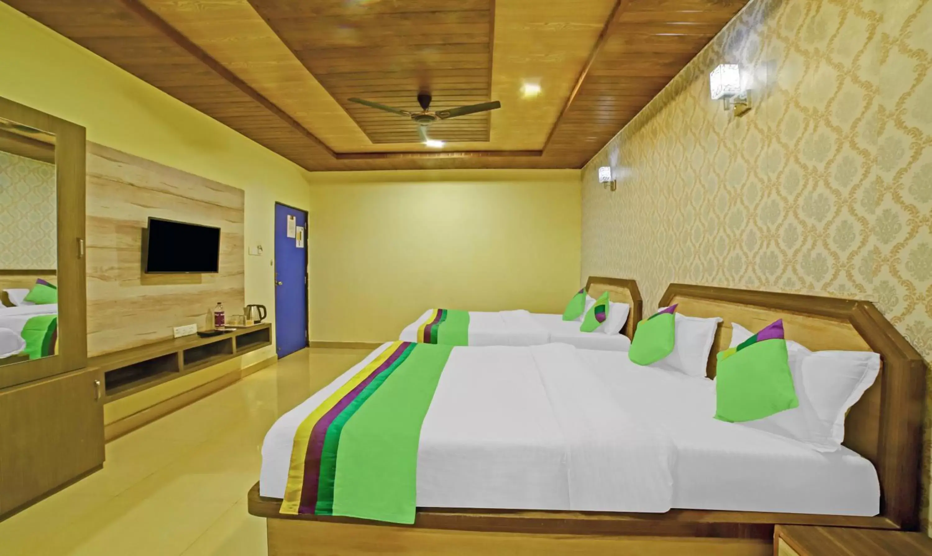 Bedroom, Bed in Treebo Balaji Excellency with Pool & Spa Bedroom, Bed in Treebo Balaji Excellency with Pool & Spa