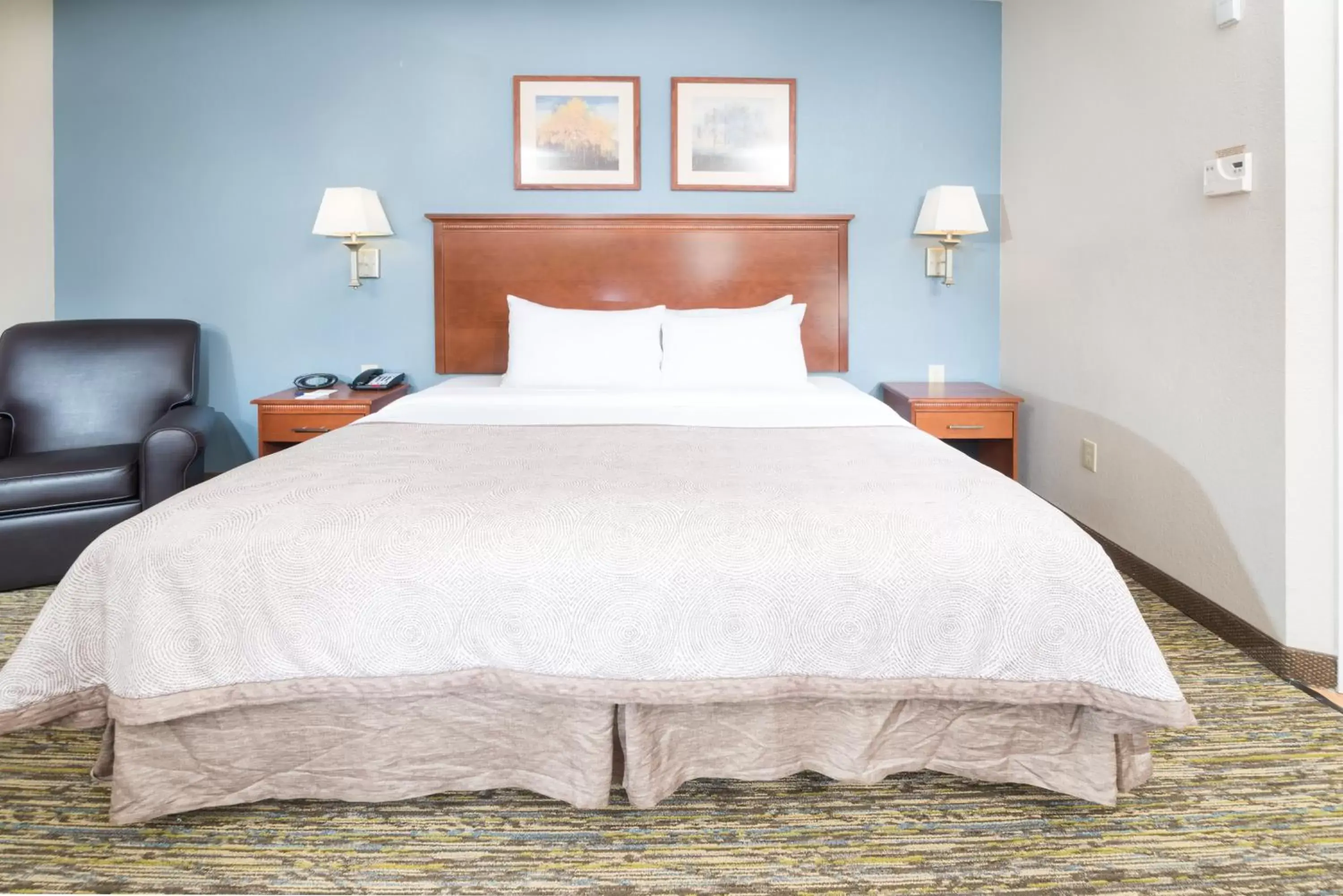 Photo of the whole room, Bed in Candlewood Suites Wake Forest-Raleigh Area, an IHG Hotel