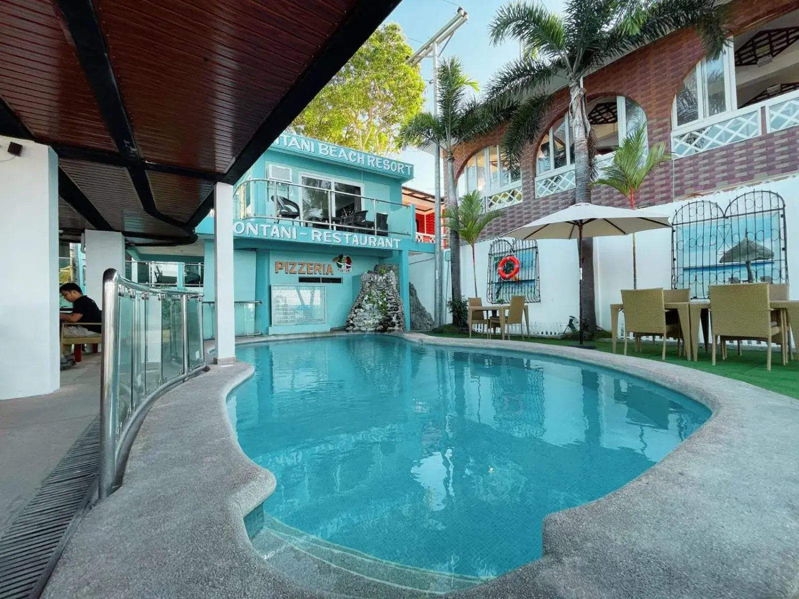 Swimming pool, Property Building in Montani Beach Resort