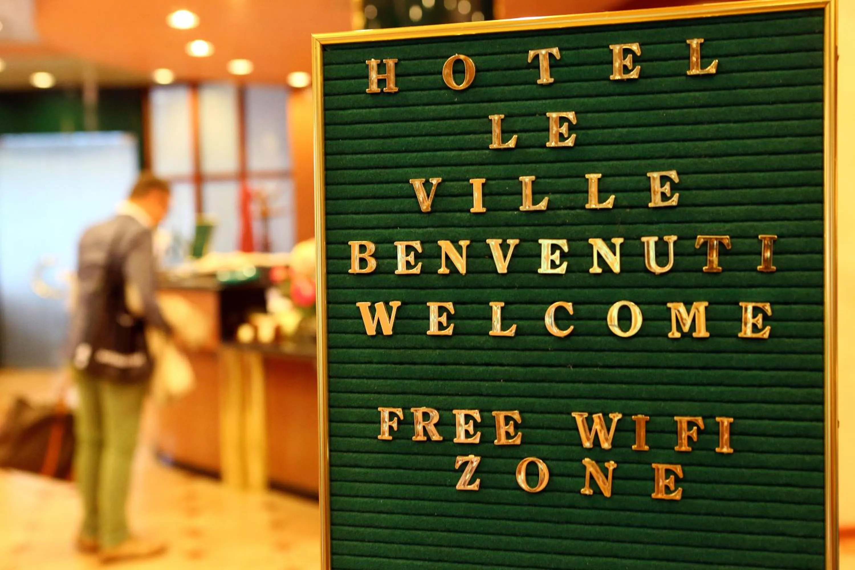 Property logo or sign in Hotel Le Ville