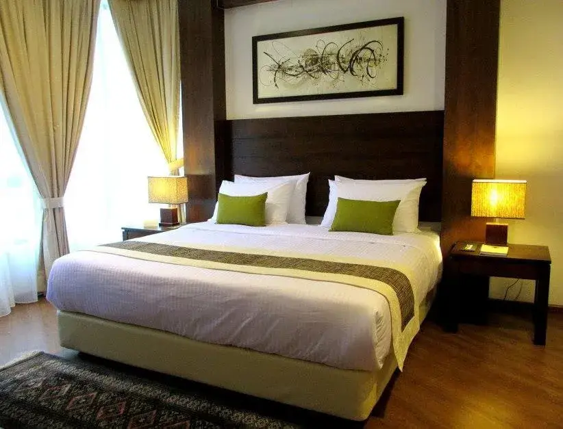 Bed in Samsuria Beach Resort & Residence