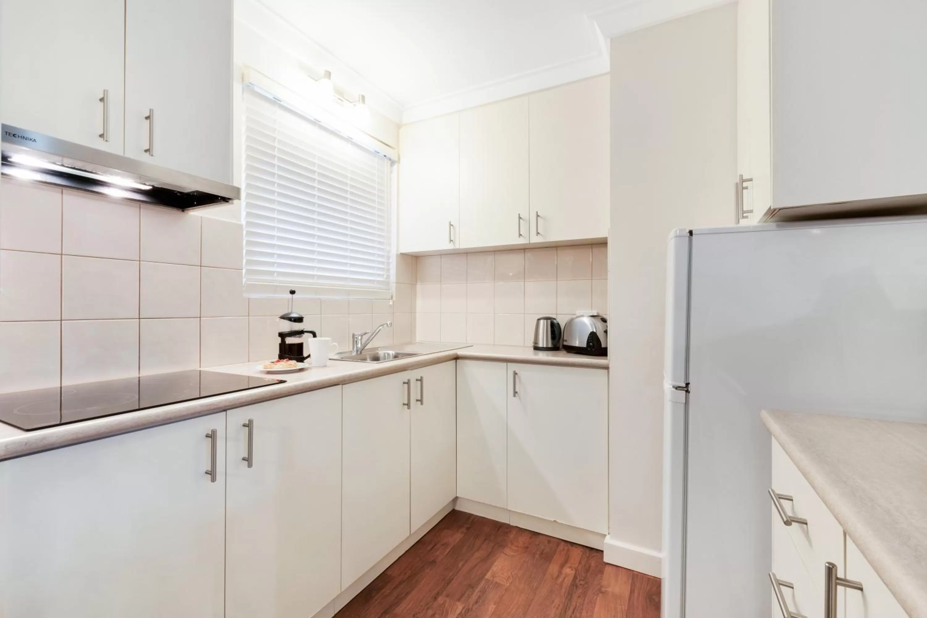 Kitchen or kitchenette in The Peninsula Riverside Serviced Apartments