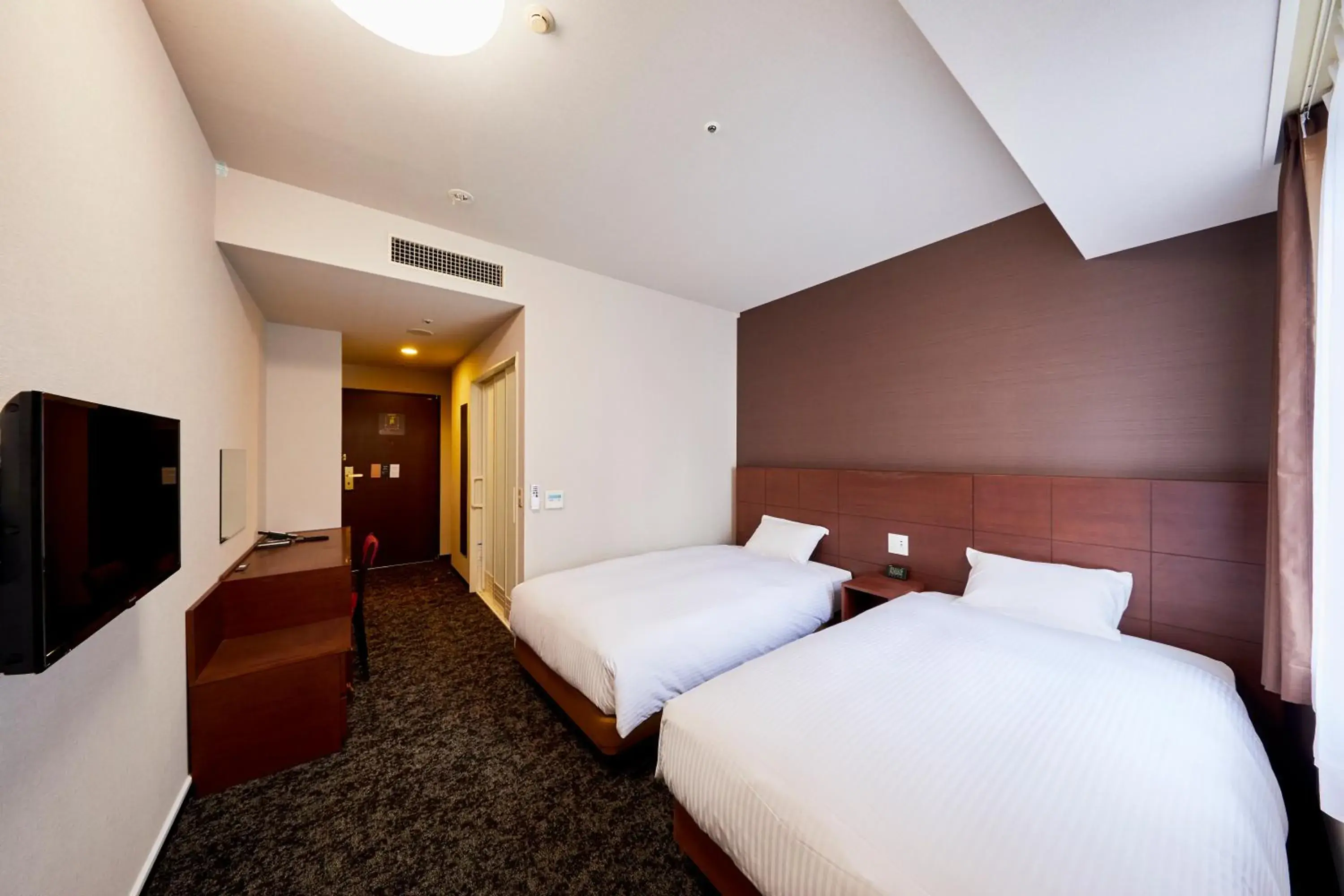 Bed in Hotel Wing International Kobe Shinnagata Ekimae