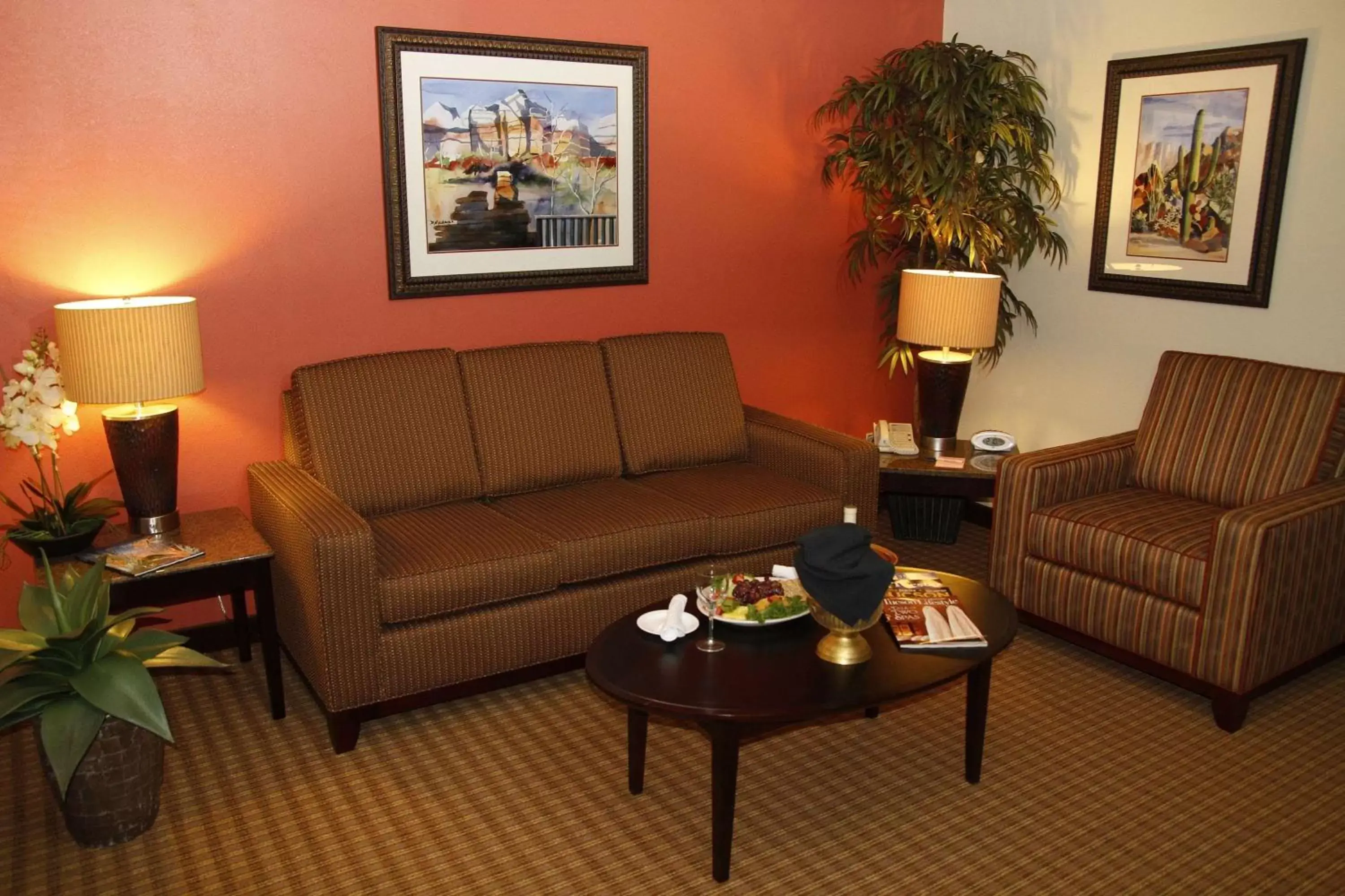 Photo of the whole room, Seating Area in Ramada by Wyndham Viscount Suites Tucson East