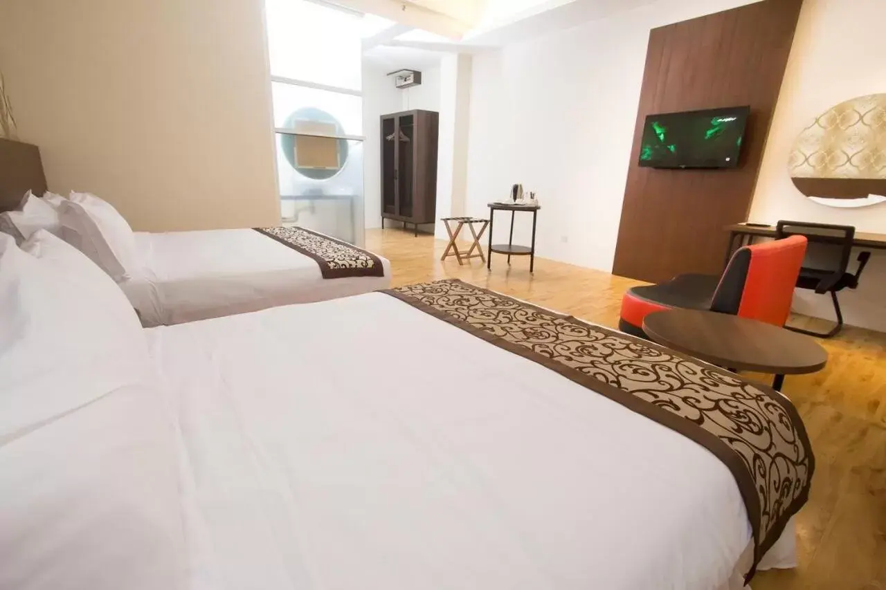 Bed in Casa Bonita Hotel