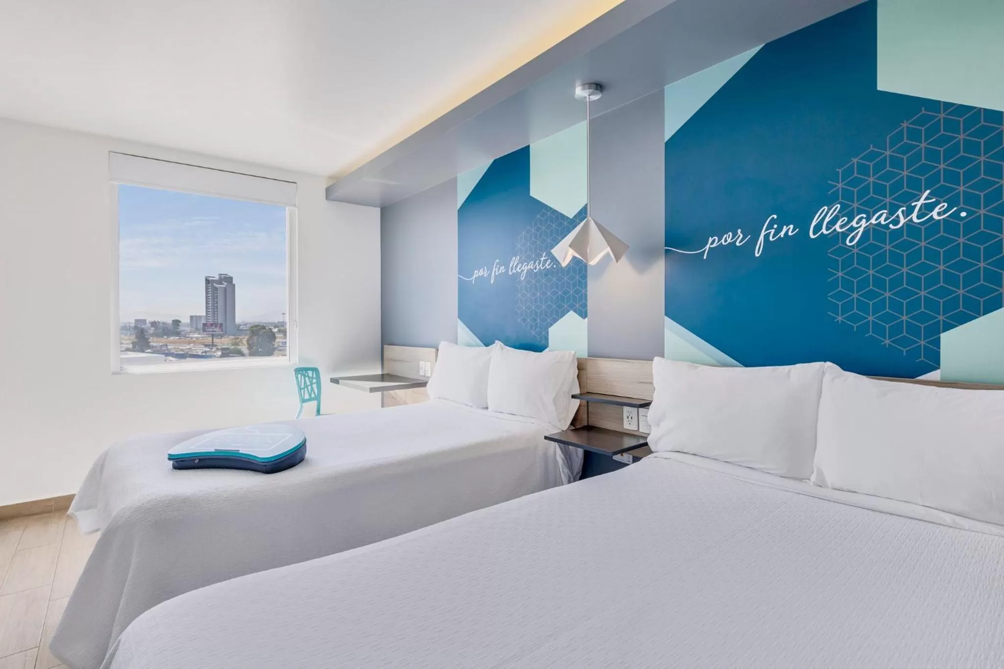 Photo of the whole room, Bed in One Puebla Angelopolis Periferico